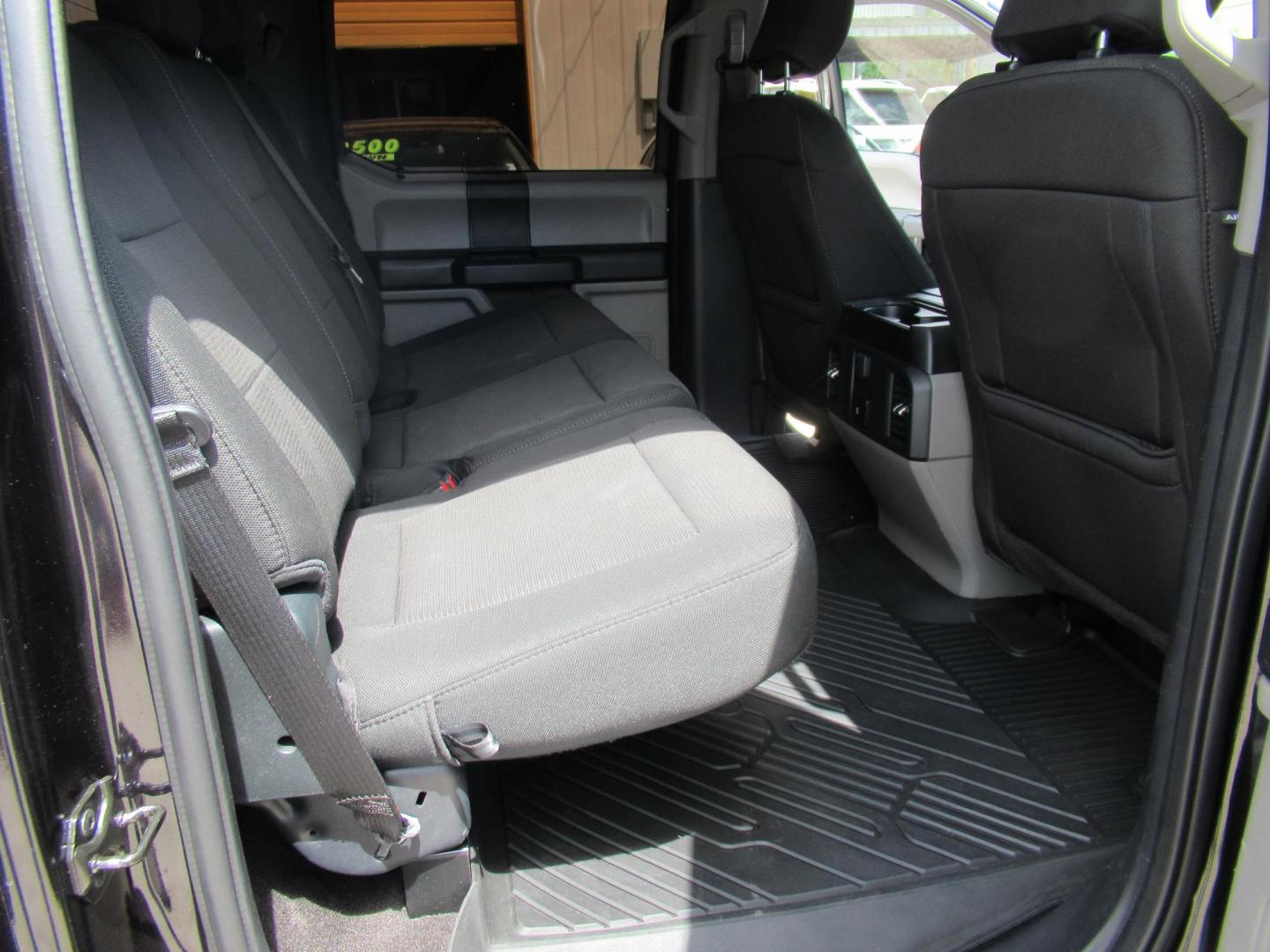 2020 Black /Black Ford F-150 King-Ranch SuperCrew 5.5-ft. 2WD (1FTEW1CP4LK) with an 2.7L V6 DOHC 24V engine, 6A transmission, located at 1511 North Shepherd Dr., Houston, TX, 77008, (281) 657-1221, 29.798361, -95.412560 - 155,141 mi VIN: 1FTEW1CP4LKD56074 Vehicle Details Crew Pickup 2.7L V6 F DOHC 24V Gasoline Rear wheel drive - Photo#12