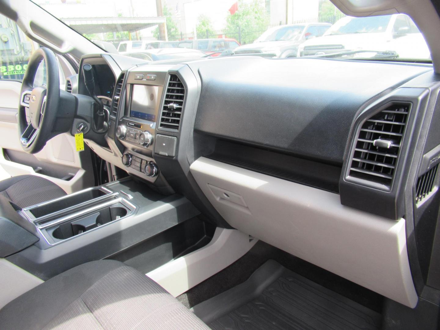 2020 Black /Black Ford F-150 King-Ranch SuperCrew 5.5-ft. 2WD (1FTEW1CP4LK) with an 2.7L V6 DOHC 24V engine, 6A transmission, located at 1511 North Shepherd Dr., Houston, TX, 77008, (281) 657-1221, 29.798361, -95.412560 - 155,141 mi VIN: 1FTEW1CP4LKD56074 Vehicle Details Crew Pickup 2.7L V6 F DOHC 24V Gasoline Rear wheel drive - Photo#16