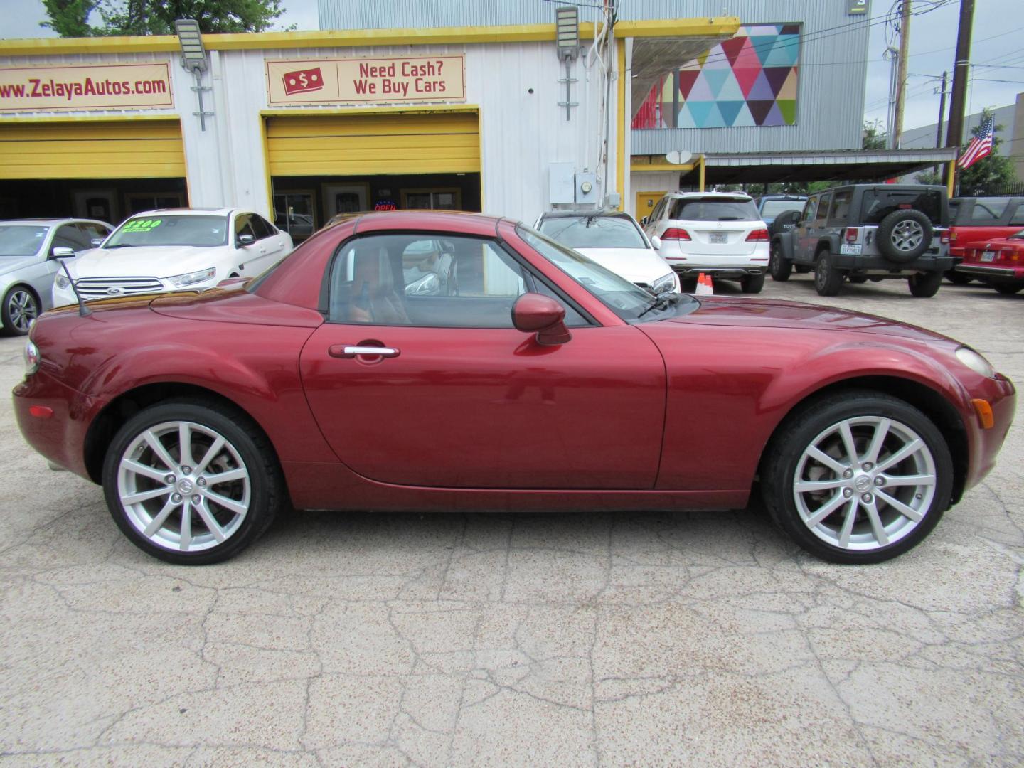 2008 Red /Brown Mazda MX-5 Miata Grand Touring Power Retractable Hardtop (JM1NC26F780) with an 2.0L L4 DOHC 16V engine, Automatic transmission, located at 1511 North Shepherd Dr., Houston, TX, 77008, (281) 657-1221, 29.798361, -95.412560 - 2008 Mazda MX-5 Miata Grand Touring 161,876 mi VIN: JM1NC26F780145276 Vehicle Details Convertible 2.0L I4 F DOHC 16V Gasoline Rear wheel drive- Photo#0