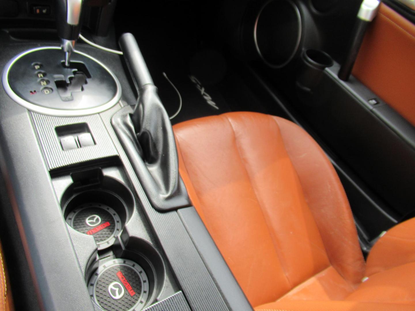 2008 Red /Brown Mazda MX-5 Miata Grand Touring Power Retractable Hardtop (JM1NC26F780) with an 2.0L L4 DOHC 16V engine, Automatic transmission, located at 1511 North Shepherd Dr., Houston, TX, 77008, (281) 657-1221, 29.798361, -95.412560 - 2008 Mazda MX-5 Miata Grand Touring 161,876 mi VIN: JM1NC26F780145276 Vehicle Details Convertible 2.0L I4 F DOHC 16V Gasoline Rear wheel drive- Photo#5
