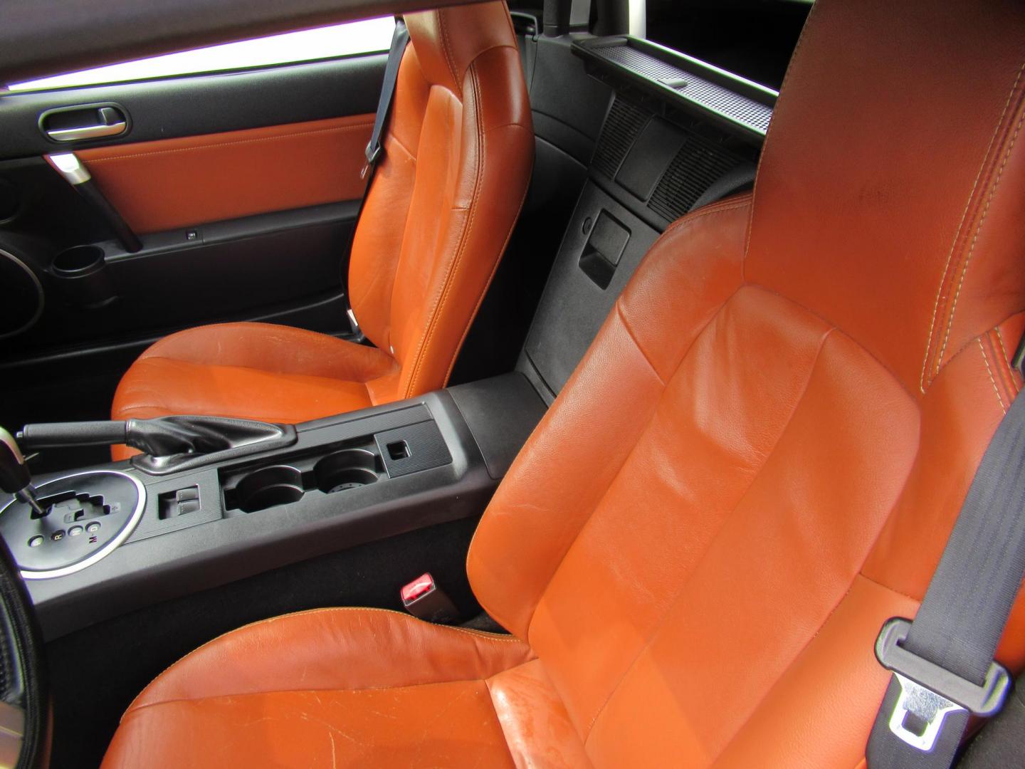 2008 Red /Brown Mazda MX-5 Miata Grand Touring Power Retractable Hardtop (JM1NC26F780) with an 2.0L L4 DOHC 16V engine, Automatic transmission, located at 1511 North Shepherd Dr., Houston, TX, 77008, (281) 657-1221, 29.798361, -95.412560 - 2008 Mazda MX-5 Miata Grand Touring 161,876 mi VIN: JM1NC26F780145276 Vehicle Details Convertible 2.0L I4 F DOHC 16V Gasoline Rear wheel drive- Photo#9