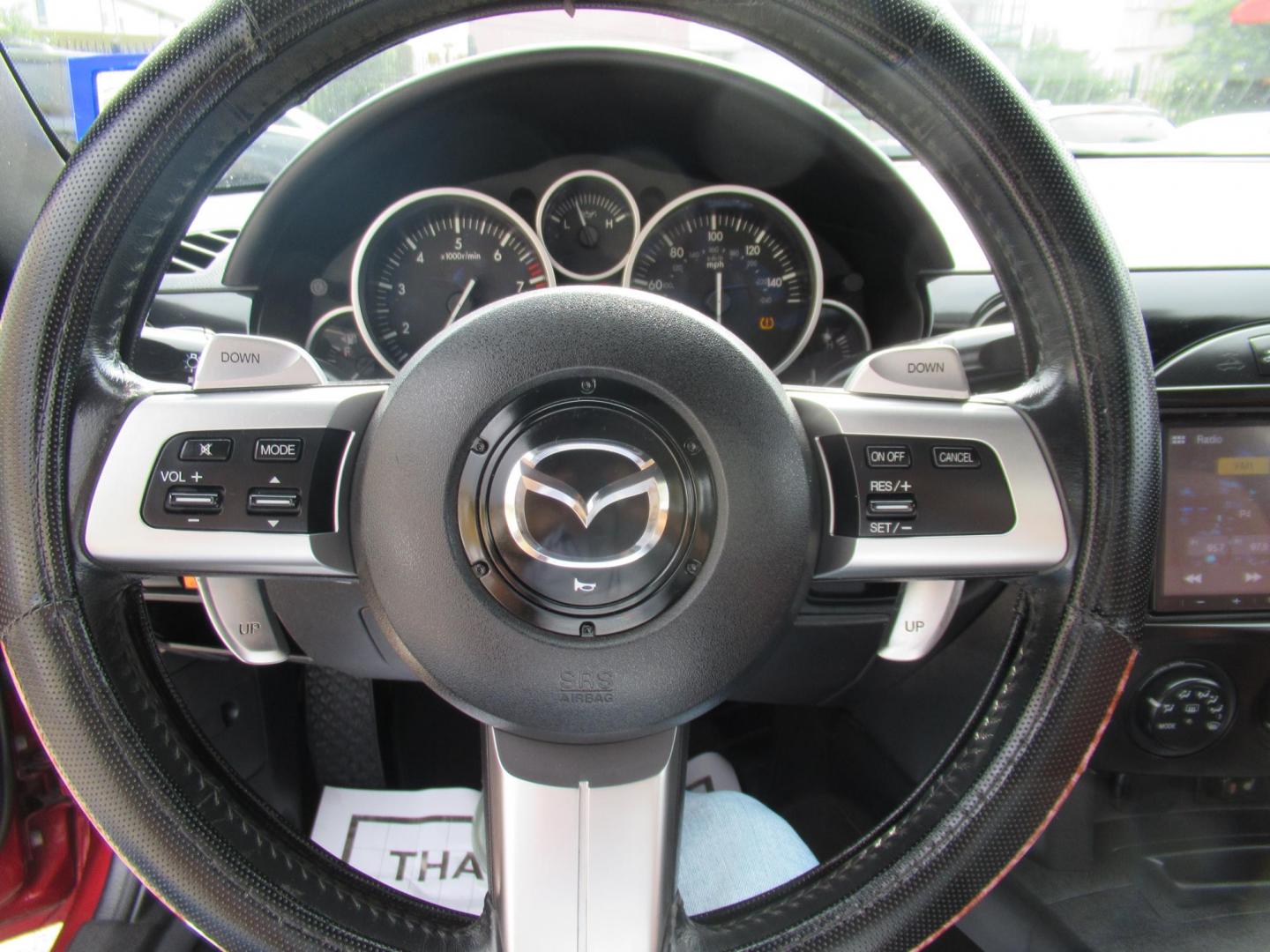2008 Red /Brown Mazda MX-5 Miata Grand Touring Power Retractable Hardtop (JM1NC26F780) with an 2.0L L4 DOHC 16V engine, Automatic transmission, located at 1511 North Shepherd Dr., Houston, TX, 77008, (281) 657-1221, 29.798361, -95.412560 - 2008 Mazda MX-5 Miata Grand Touring 161,876 mi VIN: JM1NC26F780145276 Vehicle Details Convertible 2.0L I4 F DOHC 16V Gasoline Rear wheel drive- Photo#7