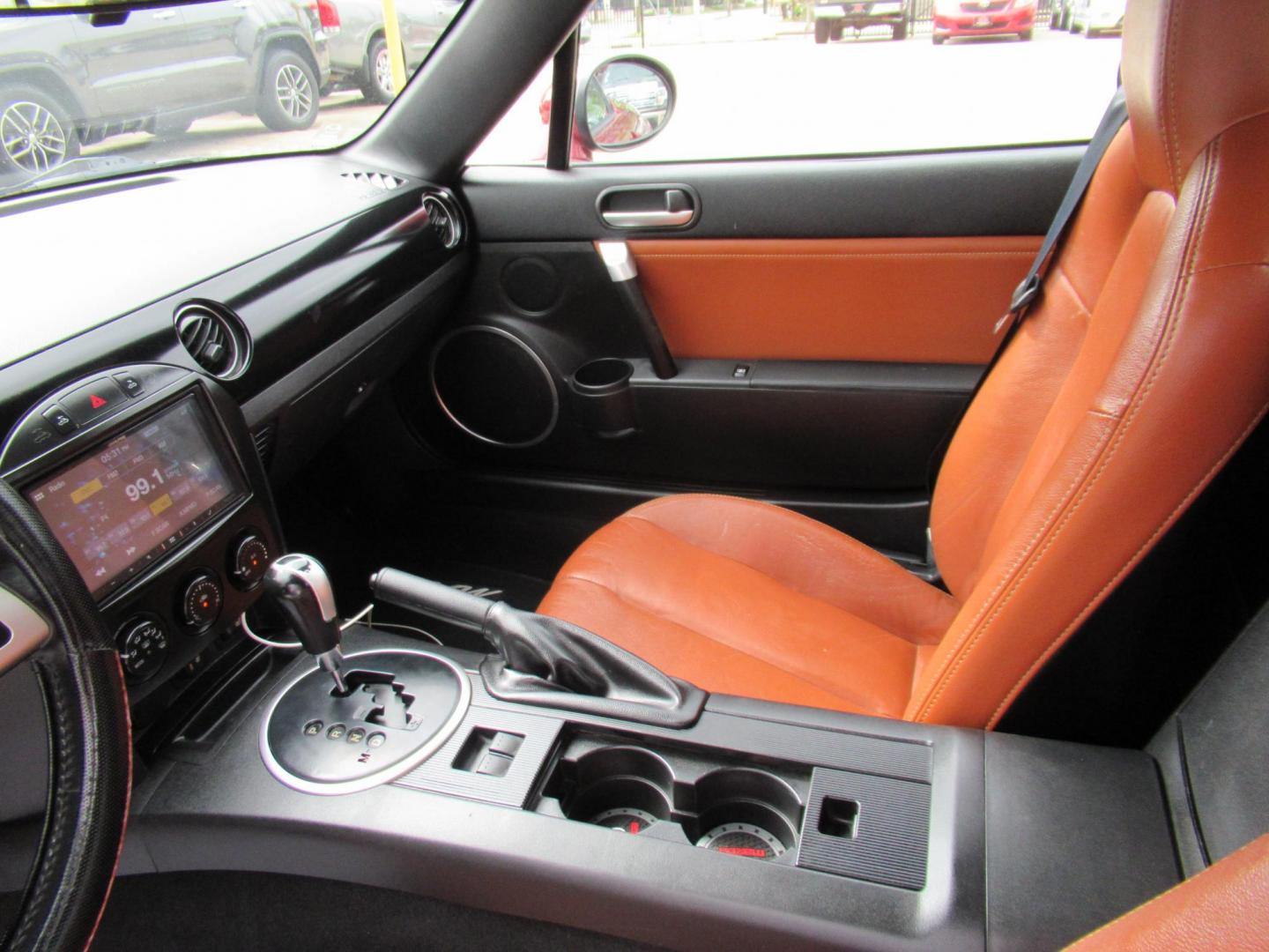 2008 Red /Brown Mazda MX-5 Miata Grand Touring Power Retractable Hardtop (JM1NC26F780) with an 2.0L L4 DOHC 16V engine, Automatic transmission, located at 1511 North Shepherd Dr., Houston, TX, 77008, (281) 657-1221, 29.798361, -95.412560 - 2008 Mazda MX-5 Miata Grand Touring 161,876 mi VIN: JM1NC26F780145276 Vehicle Details Convertible 2.0L I4 F DOHC 16V Gasoline Rear wheel drive- Photo#10