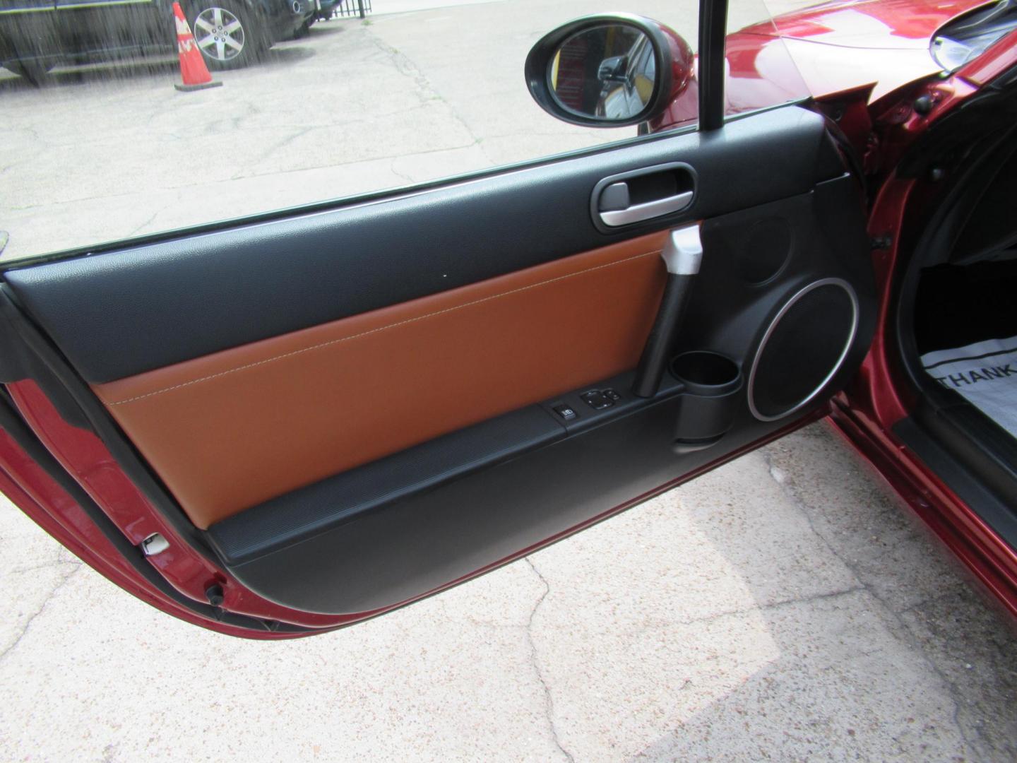 2008 Red /Brown Mazda MX-5 Miata Grand Touring Power Retractable Hardtop (JM1NC26F780) with an 2.0L L4 DOHC 16V engine, Automatic transmission, located at 1511 North Shepherd Dr., Houston, TX, 77008, (281) 657-1221, 29.798361, -95.412560 - 2008 Mazda MX-5 Miata Grand Touring 161,876 mi VIN: JM1NC26F780145276 Vehicle Details Convertible 2.0L I4 F DOHC 16V Gasoline Rear wheel drive- Photo#11