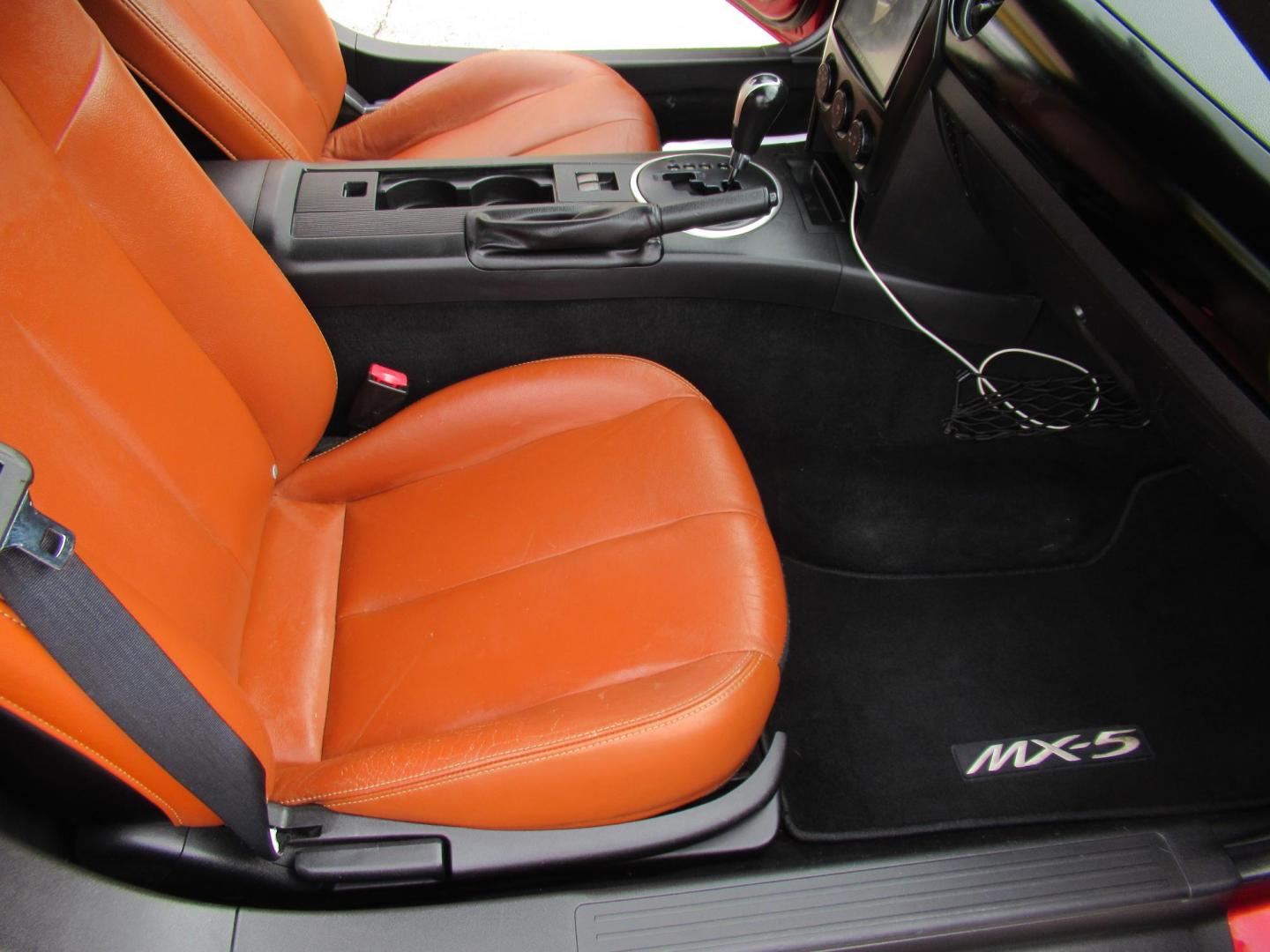 2008 Red /Brown Mazda MX-5 Miata Grand Touring Power Retractable Hardtop (JM1NC26F780) with an 2.0L L4 DOHC 16V engine, Automatic transmission, located at 1511 North Shepherd Dr., Houston, TX, 77008, (281) 657-1221, 29.798361, -95.412560 - 2008 Mazda MX-5 Miata Grand Touring 161,876 mi VIN: JM1NC26F780145276 Vehicle Details Convertible 2.0L I4 F DOHC 16V Gasoline Rear wheel drive- Photo#13