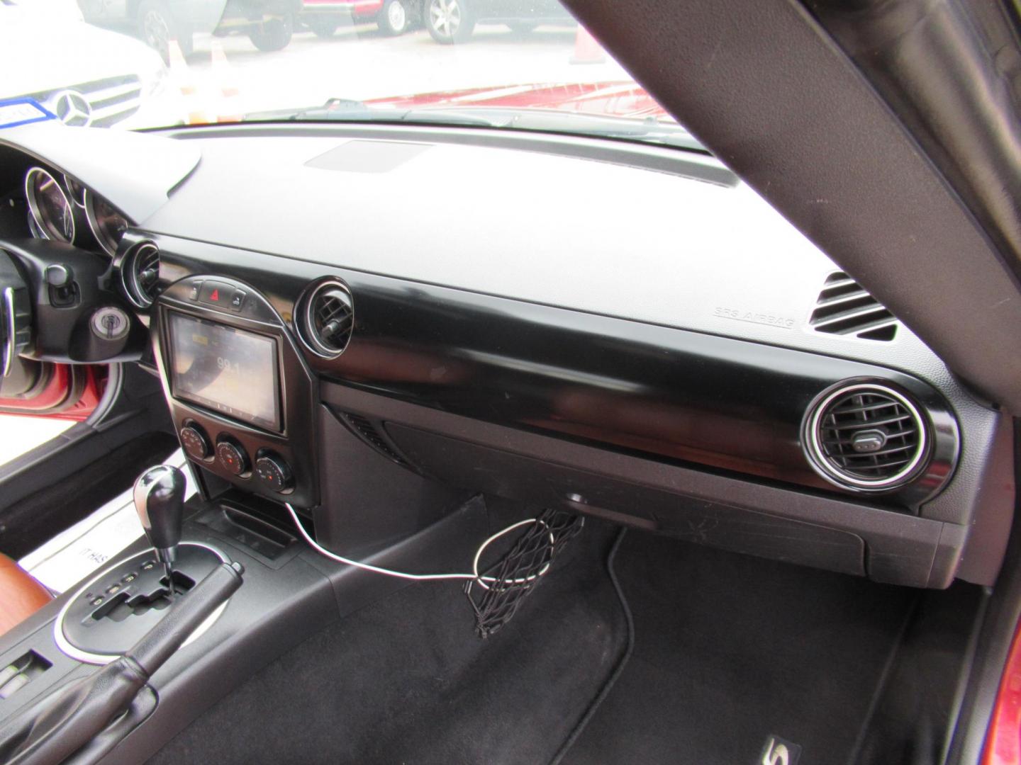 2008 Red /Brown Mazda MX-5 Miata Grand Touring Power Retractable Hardtop (JM1NC26F780) with an 2.0L L4 DOHC 16V engine, Automatic transmission, located at 1511 North Shepherd Dr., Houston, TX, 77008, (281) 657-1221, 29.798361, -95.412560 - 2008 Mazda MX-5 Miata Grand Touring 161,876 mi VIN: JM1NC26F780145276 Vehicle Details Convertible 2.0L I4 F DOHC 16V Gasoline Rear wheel drive- Photo#14
