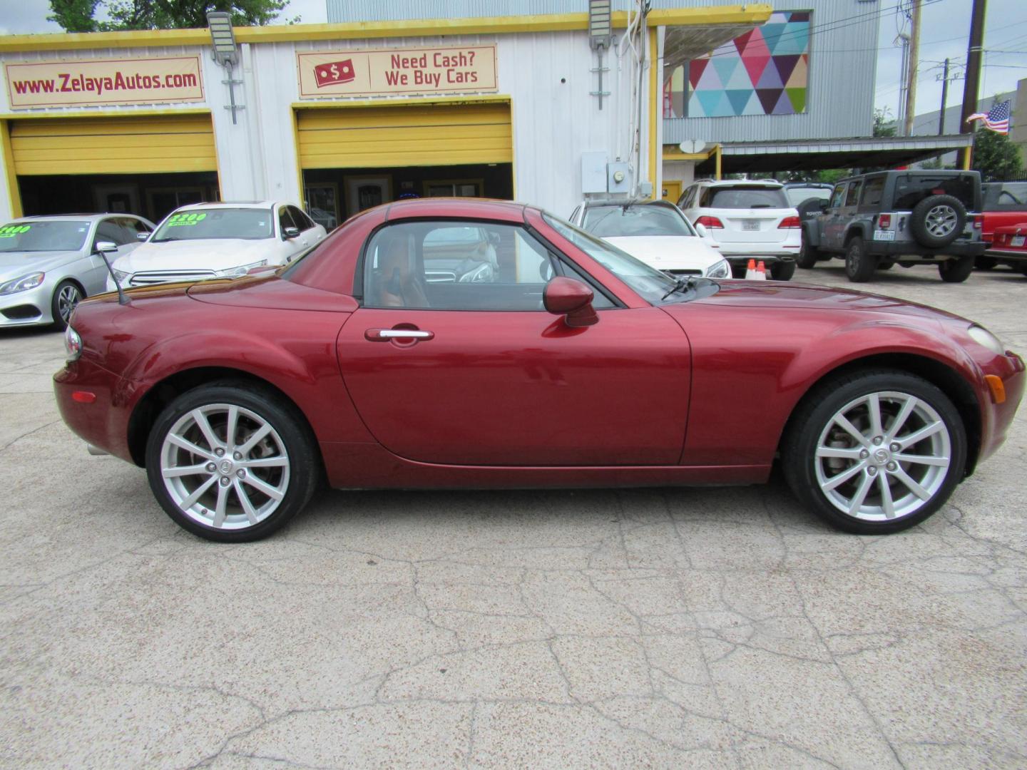 2008 Red /Brown Mazda MX-5 Miata Grand Touring Power Retractable Hardtop (JM1NC26F780) with an 2.0L L4 DOHC 16V engine, Automatic transmission, located at 1511 North Shepherd Dr., Houston, TX, 77008, (281) 657-1221, 29.798361, -95.412560 - 2008 Mazda MX-5 Miata Grand Touring 161,876 mi VIN: JM1NC26F780145276 Vehicle Details Convertible 2.0L I4 F DOHC 16V Gasoline Rear wheel drive- Photo#18