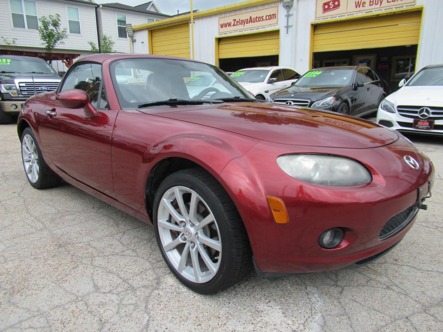 2008 Red /Brown Mazda MX-5 Miata Grand Touring Power Retractable Hardtop (JM1NC26F780) with an 2.0L L4 DOHC 16V engine, Automatic transmission, located at 1511 North Shepherd Dr., Houston, TX, 77008, (281) 657-1221, 29.798361, -95.412560 - 2008 Mazda MX-5 Miata Grand Touring 161,876 mi VIN: JM1NC26F780145276 Vehicle Details Convertible 2.0L I4 F DOHC 16V Gasoline Rear wheel drive- Photo#20