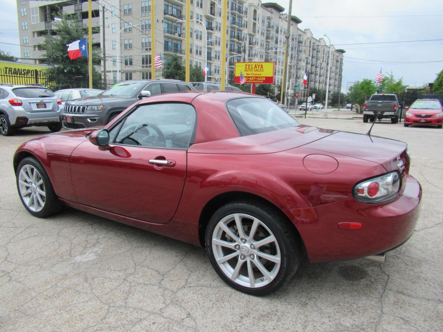 2008 Red /Brown Mazda MX-5 Miata Grand Touring Power Retractable Hardtop (JM1NC26F780) with an 2.0L L4 DOHC 16V engine, Automatic transmission, located at 1511 North Shepherd Dr., Houston, TX, 77008, (281) 657-1221, 29.798361, -95.412560 - 2008 Mazda MX-5 Miata Grand Touring 161,876 mi VIN: JM1NC26F780145276 Vehicle Details Convertible 2.0L I4 F DOHC 16V Gasoline Rear wheel drive- Photo#23