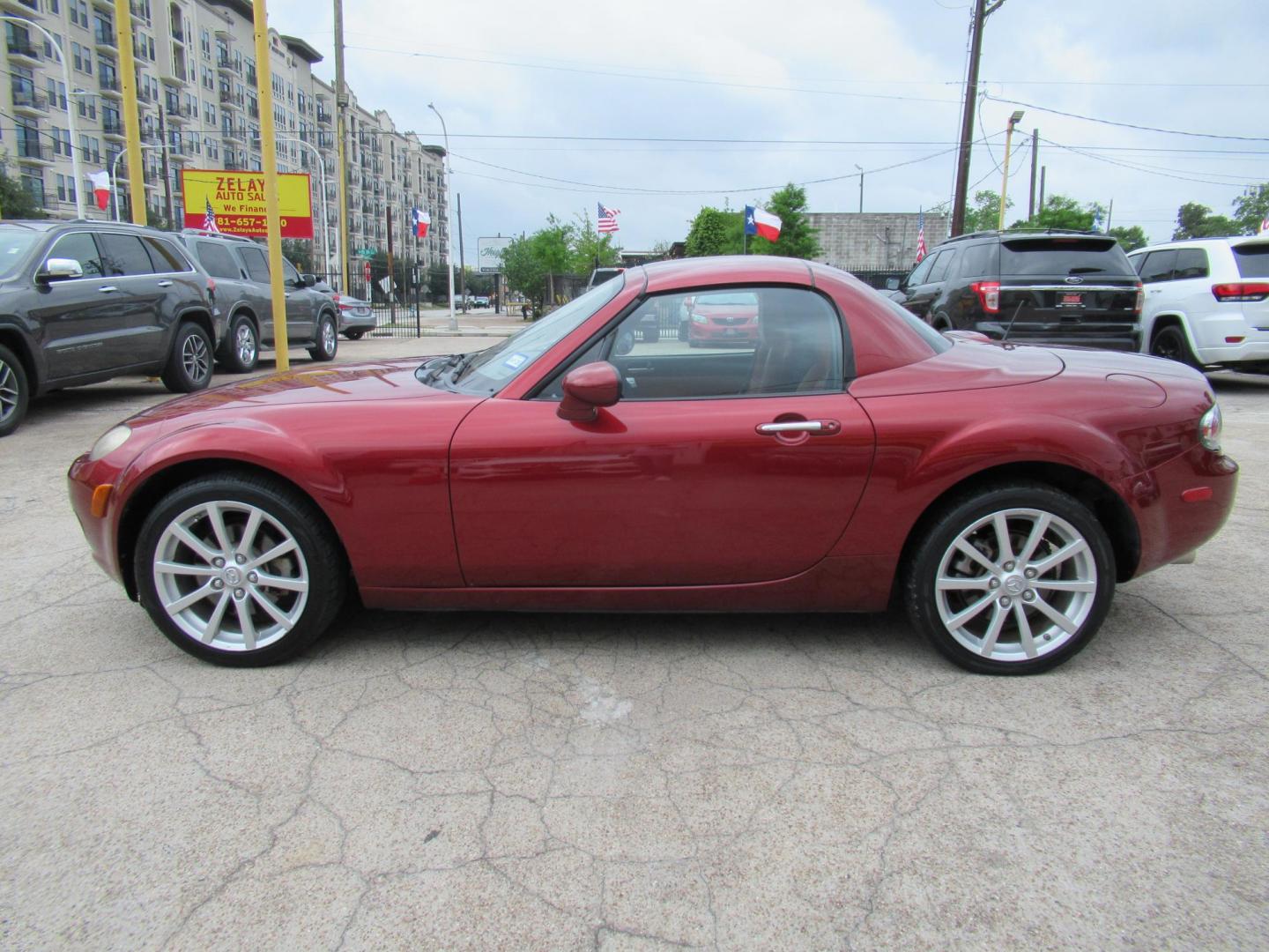 2008 Red /Brown Mazda MX-5 Miata Grand Touring Power Retractable Hardtop (JM1NC26F780) with an 2.0L L4 DOHC 16V engine, Automatic transmission, located at 1511 North Shepherd Dr., Houston, TX, 77008, (281) 657-1221, 29.798361, -95.412560 - 2008 Mazda MX-5 Miata Grand Touring 161,876 mi VIN: JM1NC26F780145276 Vehicle Details Convertible 2.0L I4 F DOHC 16V Gasoline Rear wheel drive- Photo#24
