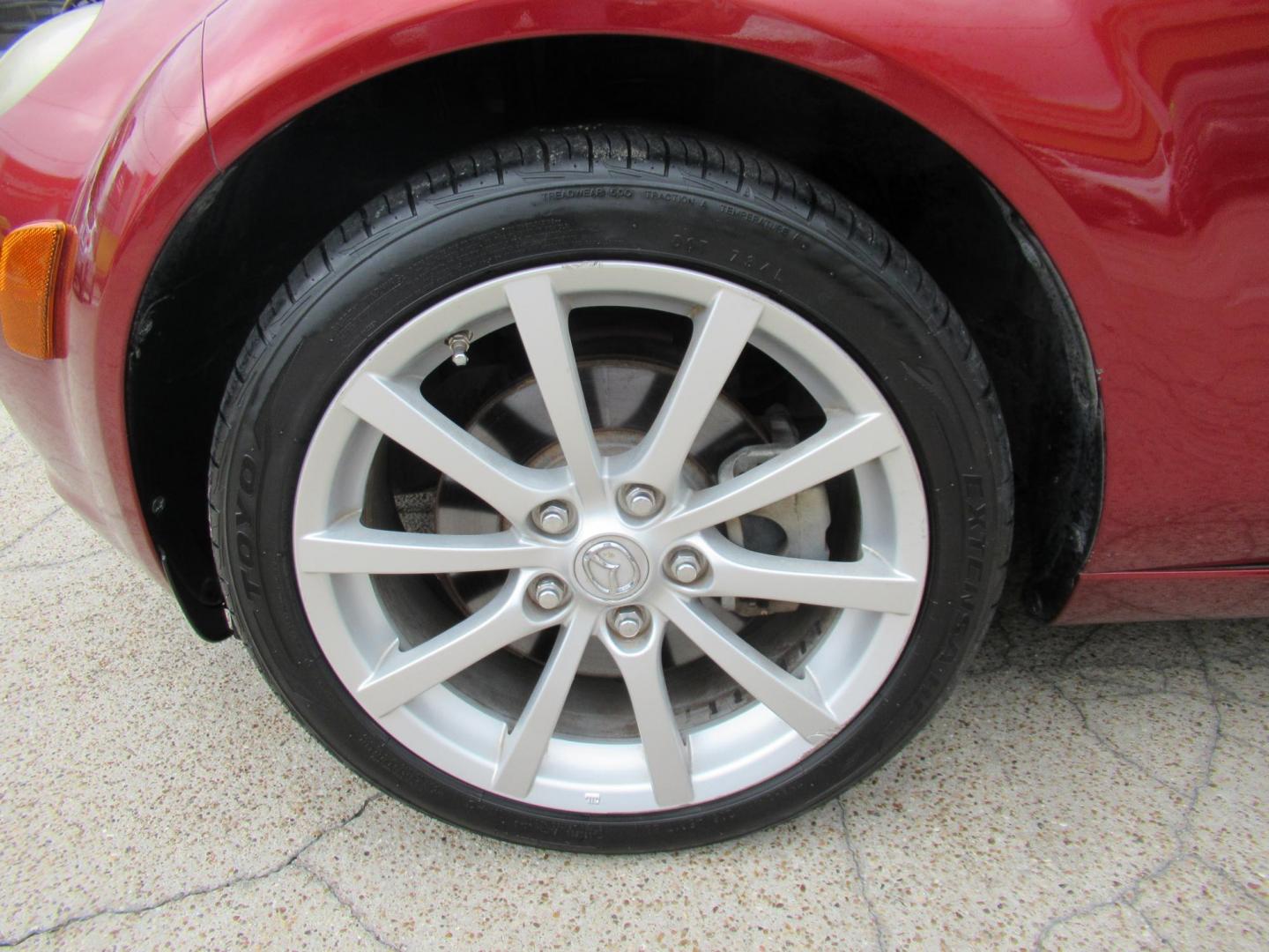 2008 Red /Brown Mazda MX-5 Miata Grand Touring Power Retractable Hardtop (JM1NC26F780) with an 2.0L L4 DOHC 16V engine, Automatic transmission, located at 1511 North Shepherd Dr., Houston, TX, 77008, (281) 657-1221, 29.798361, -95.412560 - 2008 Mazda MX-5 Miata Grand Touring 161,876 mi VIN: JM1NC26F780145276 Vehicle Details Convertible 2.0L I4 F DOHC 16V Gasoline Rear wheel drive- Photo#26