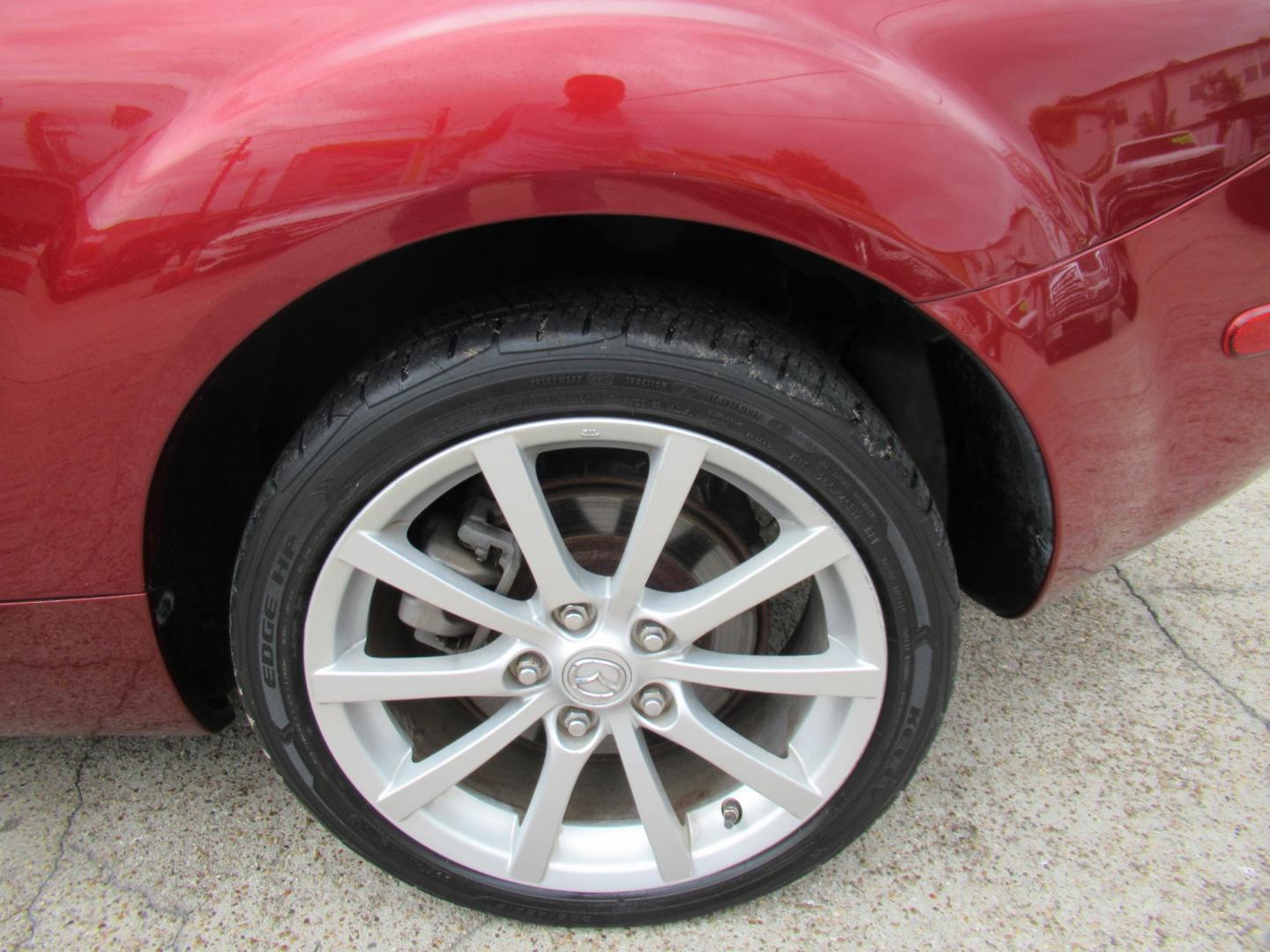 2008 Red /Brown Mazda MX-5 Miata Grand Touring Power Retractable Hardtop (JM1NC26F780) with an 2.0L L4 DOHC 16V engine, Automatic transmission, located at 1511 North Shepherd Dr., Houston, TX, 77008, (281) 657-1221, 29.798361, -95.412560 - 2008 Mazda MX-5 Miata Grand Touring 161,876 mi VIN: JM1NC26F780145276 Vehicle Details Convertible 2.0L I4 F DOHC 16V Gasoline Rear wheel drive- Photo#27