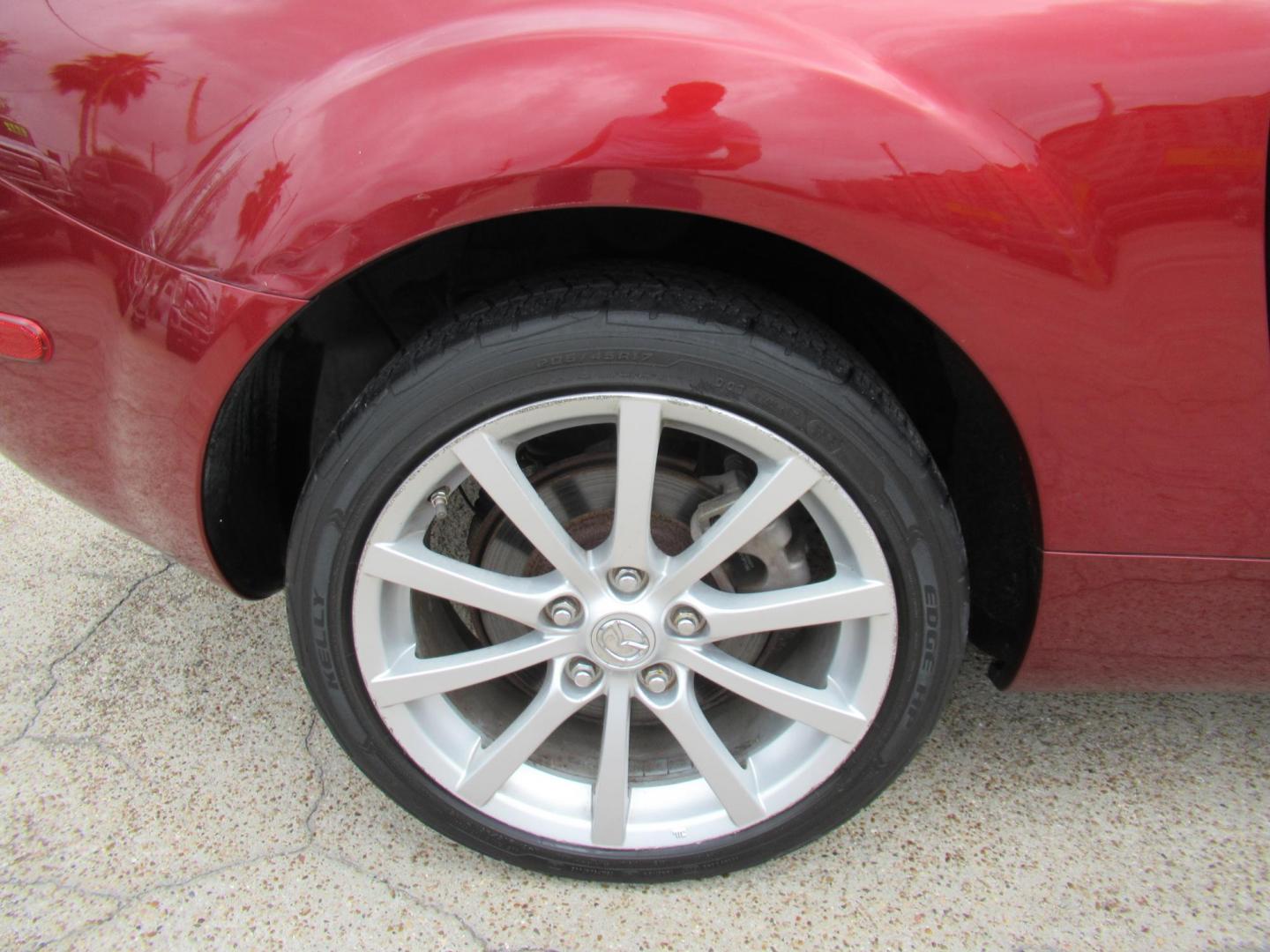 2008 Red /Brown Mazda MX-5 Miata Grand Touring Power Retractable Hardtop (JM1NC26F780) with an 2.0L L4 DOHC 16V engine, Automatic transmission, located at 1511 North Shepherd Dr., Houston, TX, 77008, (281) 657-1221, 29.798361, -95.412560 - 2008 Mazda MX-5 Miata Grand Touring 161,876 mi VIN: JM1NC26F780145276 Vehicle Details Convertible 2.0L I4 F DOHC 16V Gasoline Rear wheel drive- Photo#28