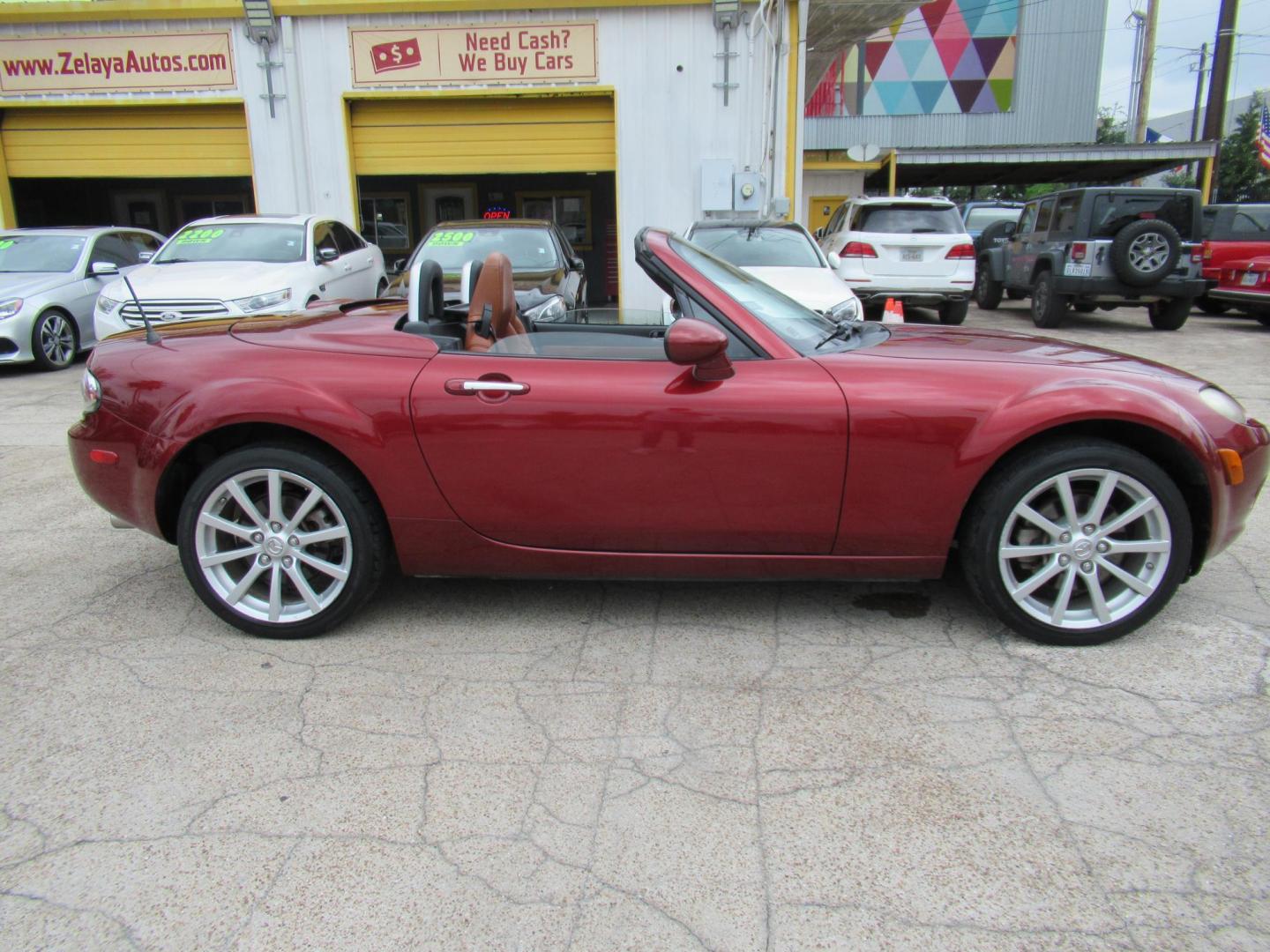 2008 Red /Brown Mazda MX-5 Miata Grand Touring Power Retractable Hardtop (JM1NC26F780) with an 2.0L L4 DOHC 16V engine, Automatic transmission, located at 1511 North Shepherd Dr., Houston, TX, 77008, (281) 657-1221, 29.798361, -95.412560 - 2008 Mazda MX-5 Miata Grand Touring 161,876 mi VIN: JM1NC26F780145276 Vehicle Details Convertible 2.0L I4 F DOHC 16V Gasoline Rear wheel drive- Photo#31