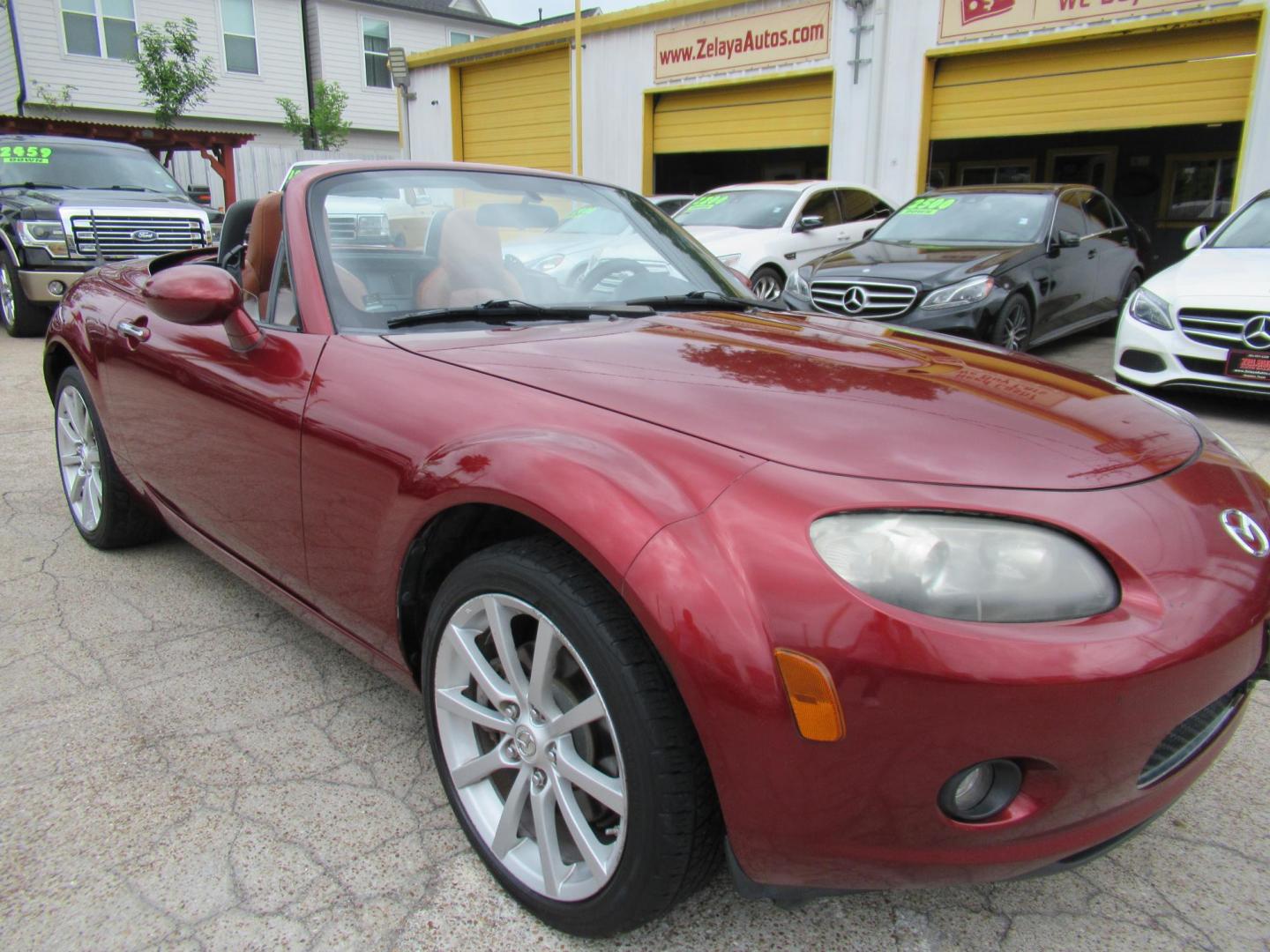 2008 Red /Brown Mazda MX-5 Miata Grand Touring Power Retractable Hardtop (JM1NC26F780) with an 2.0L L4 DOHC 16V engine, Automatic transmission, located at 1511 North Shepherd Dr., Houston, TX, 77008, (281) 657-1221, 29.798361, -95.412560 - 2008 Mazda MX-5 Miata Grand Touring 161,876 mi VIN: JM1NC26F780145276 Vehicle Details Convertible 2.0L I4 F DOHC 16V Gasoline Rear wheel drive- Photo#32