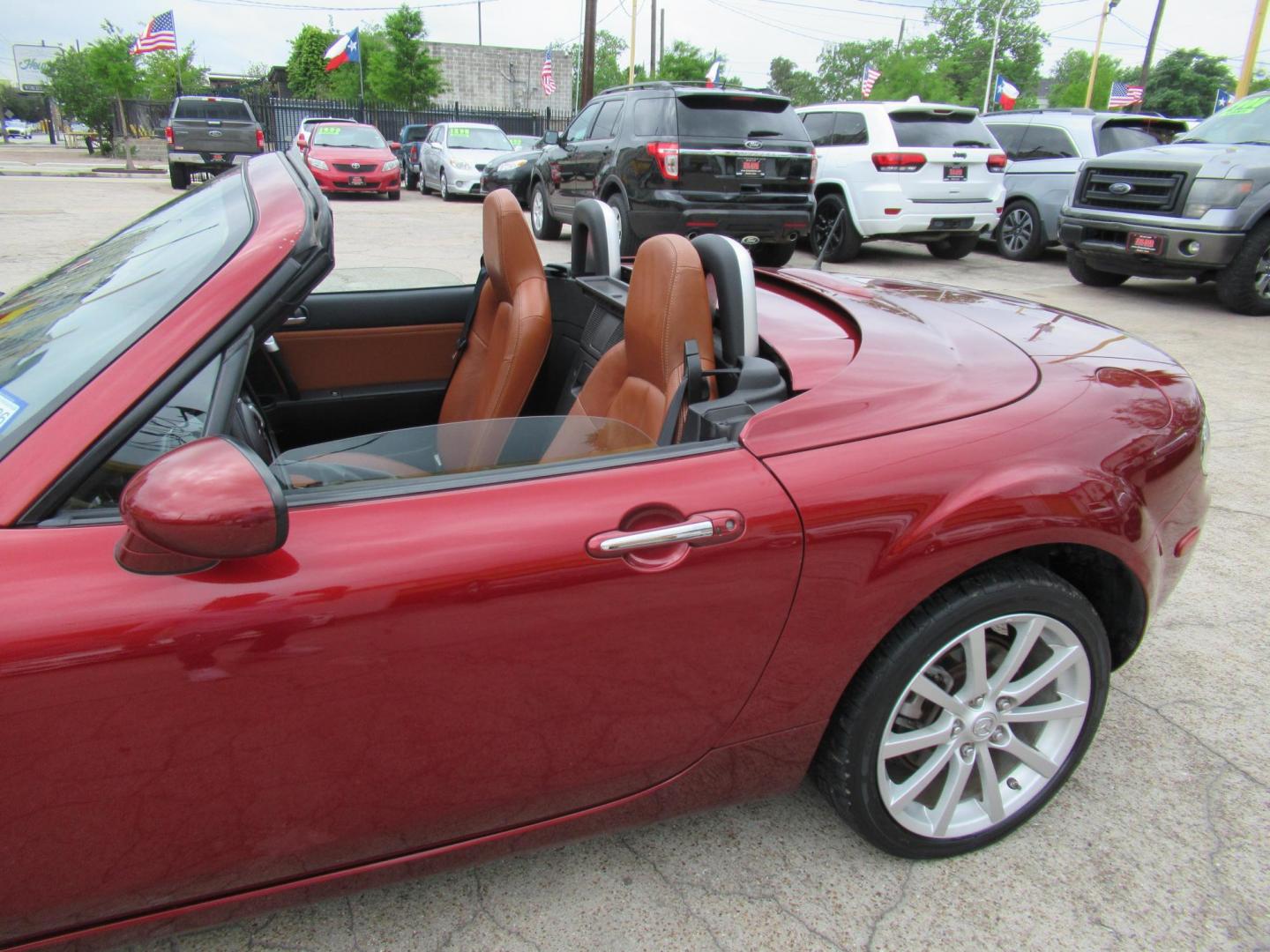 2008 Red /Brown Mazda MX-5 Miata Grand Touring Power Retractable Hardtop (JM1NC26F780) with an 2.0L L4 DOHC 16V engine, Automatic transmission, located at 1511 North Shepherd Dr., Houston, TX, 77008, (281) 657-1221, 29.798361, -95.412560 - 2008 Mazda MX-5 Miata Grand Touring 161,876 mi VIN: JM1NC26F780145276 Vehicle Details Convertible 2.0L I4 F DOHC 16V Gasoline Rear wheel drive- Photo#33