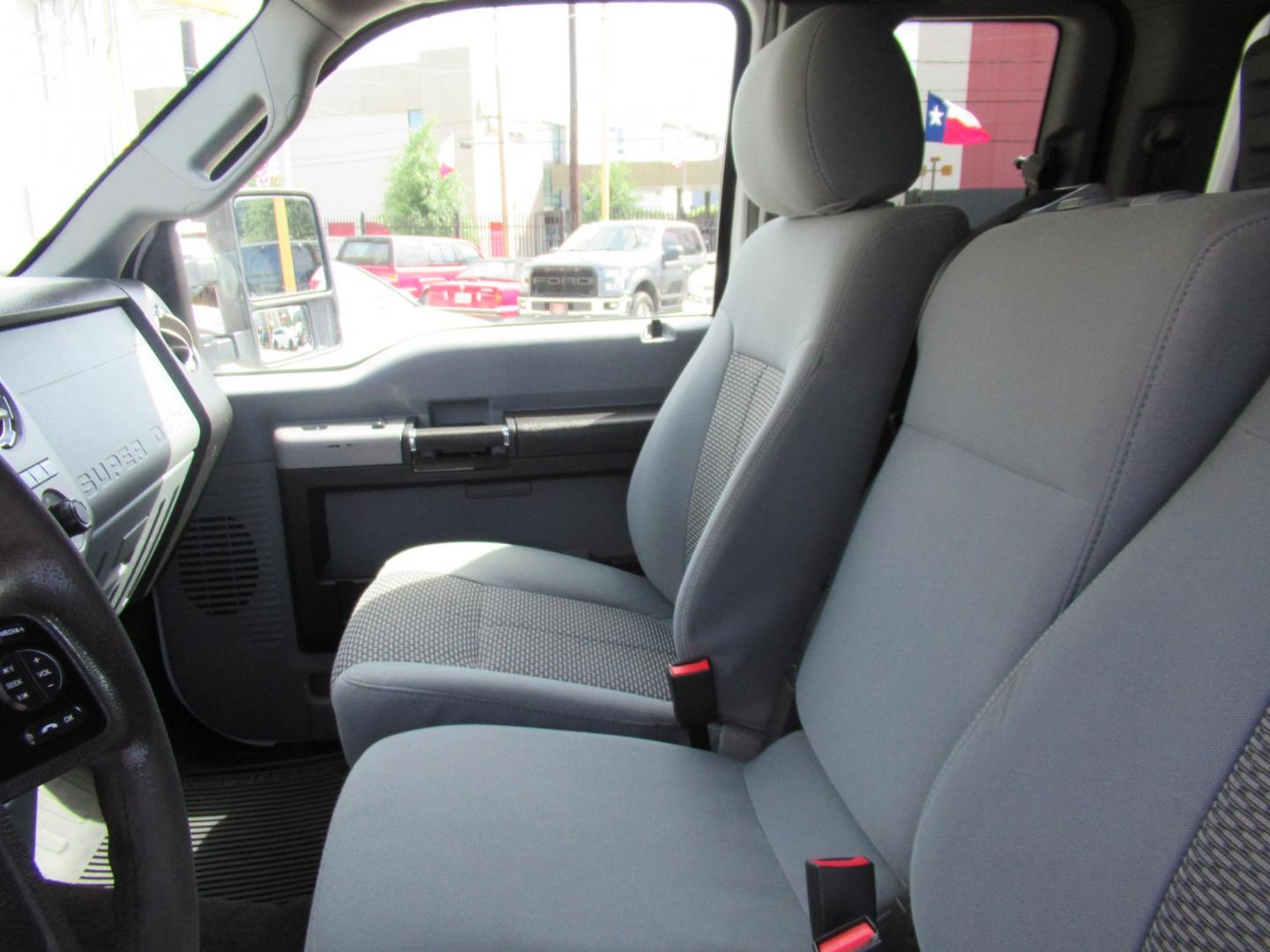 2015 White /Gray Ford F-250 SD XLT SuperCab Long Bed 4WD (1FT7X2B69FE) with an 6.2L V8 OHV 16V engine, Automatic transmission, located at 1511 North Shepherd Dr., Houston, TX, 77008, (281) 657-1221, 29.798361, -95.412560 - 2015 Ford F-250 Super Duty XLT 218,902 mi VIN: 1FT7X2B69FEA75606 Vehicle Details 4 Door Extended Cab Pickup 6.2L V8 F SOHC 16V Gasoline Rear wheel drive w/ 4X4 - Photo#2