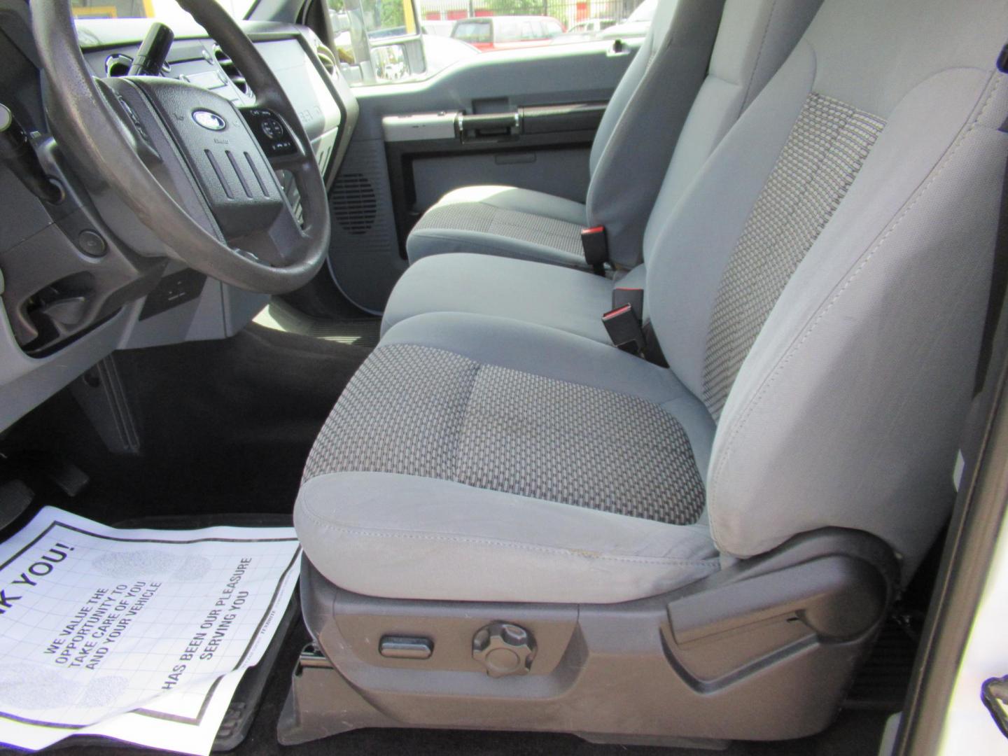 2015 White /Gray Ford F-250 SD XLT SuperCab Long Bed 4WD (1FT7X2B69FE) with an 6.2L V8 OHV 16V engine, Automatic transmission, located at 1511 North Shepherd Dr., Houston, TX, 77008, (281) 657-1221, 29.798361, -95.412560 - 2015 Ford F-250 Super Duty XLT 218,902 mi VIN: 1FT7X2B69FEA75606 Vehicle Details 4 Door Extended Cab Pickup 6.2L V8 F SOHC 16V Gasoline Rear wheel drive w/ 4X4 - Photo#1