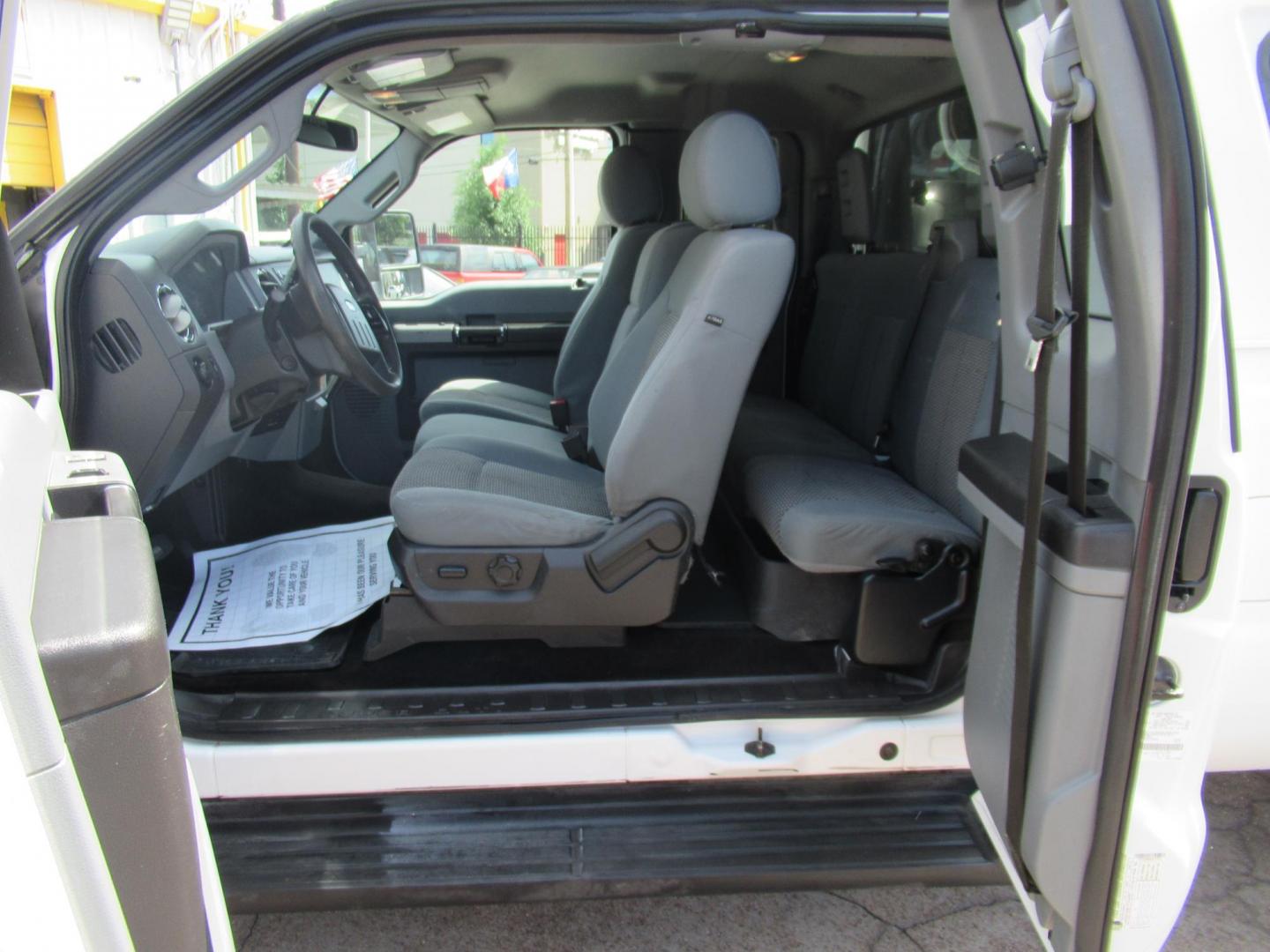 2015 White /Gray Ford F-250 SD XLT SuperCab Long Bed 4WD (1FT7X2B69FE) with an 6.2L V8 OHV 16V engine, Automatic transmission, located at 1511 North Shepherd Dr., Houston, TX, 77008, (281) 657-1221, 29.798361, -95.412560 - 2015 Ford F-250 Super Duty XLT 218,902 mi VIN: 1FT7X2B69FEA75606 Vehicle Details 4 Door Extended Cab Pickup 6.2L V8 F SOHC 16V Gasoline Rear wheel drive w/ 4X4 - Photo#14