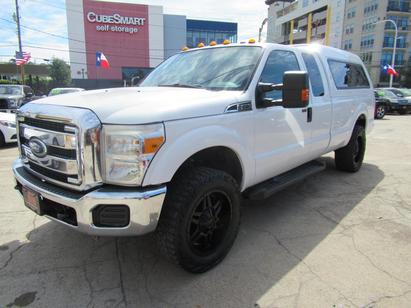 2015 White /Gray Ford F-250 SD XLT SuperCab Long Bed 4WD (1FT7X2B69FE) with an 6.2L V8 OHV 16V engine, Automatic transmission, located at 1511 North Shepherd Dr., Houston, TX, 77008, (281) 657-1221, 29.798361, -95.412560 - 2015 Ford F-250 Super Duty XLT 218,902 mi VIN: 1FT7X2B69FEA75606 Vehicle Details 4 Door Extended Cab Pickup 6.2L V8 F SOHC 16V Gasoline Rear wheel drive w/ 4X4 - Photo#23