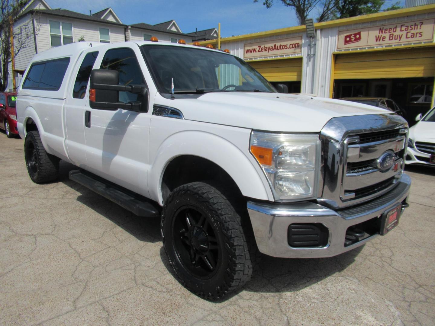 2015 White /Gray Ford F-250 SD XLT SuperCab Long Bed 4WD (1FT7X2B69FE) with an 6.2L V8 OHV 16V engine, Automatic transmission, located at 1511 North Shepherd Dr., Houston, TX, 77008, (281) 657-1221, 29.798361, -95.412560 - 2015 Ford F-250 Super Duty XLT 218,902 mi VIN: 1FT7X2B69FEA75606 Vehicle Details 4 Door Extended Cab Pickup 6.2L V8 F SOHC 16V Gasoline Rear wheel drive w/ 4X4 - Photo#31