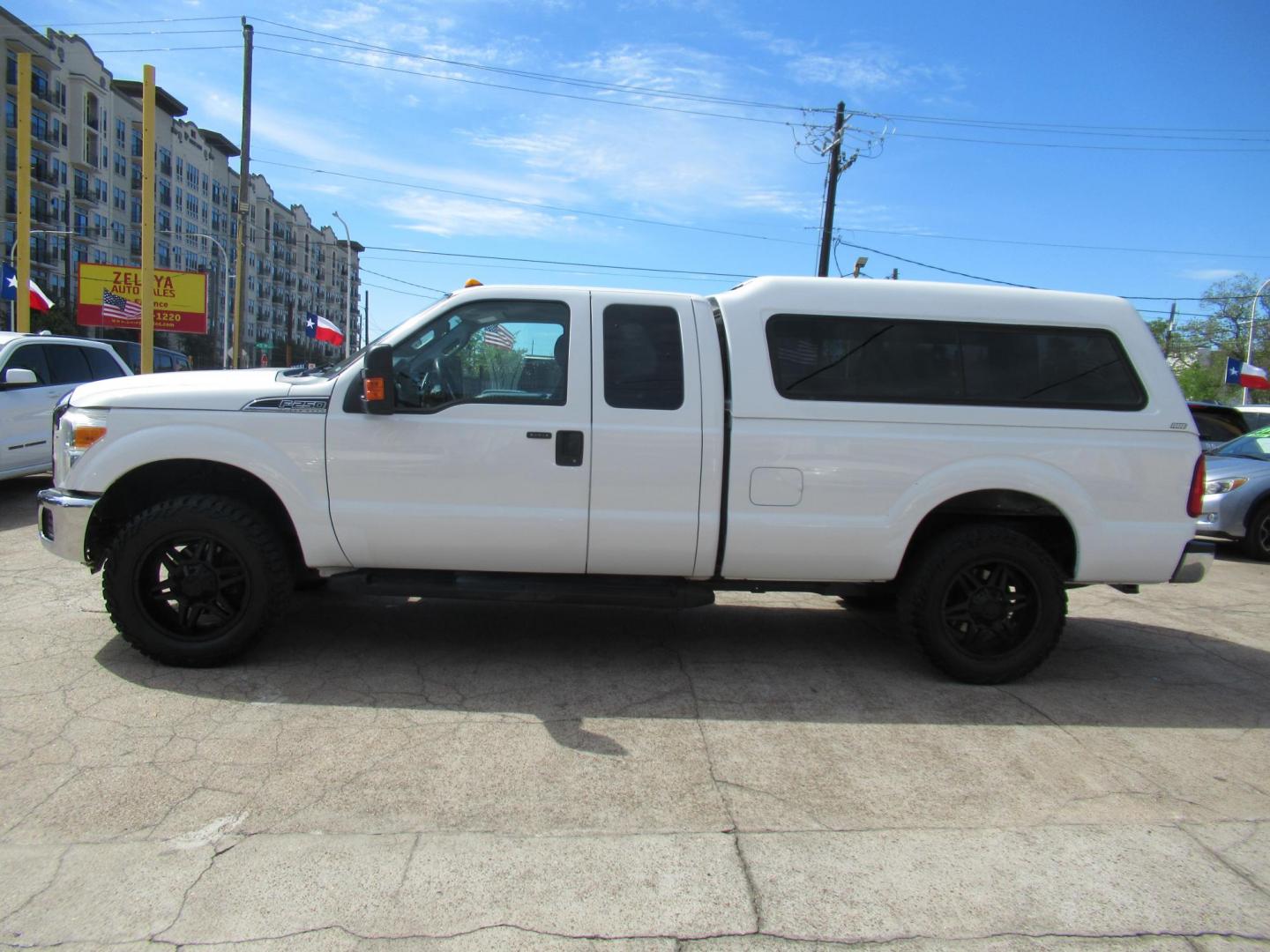 2015 White /Gray Ford F-250 SD XLT SuperCab Long Bed 4WD (1FT7X2B69FE) with an 6.2L V8 OHV 16V engine, Automatic transmission, located at 1511 North Shepherd Dr., Houston, TX, 77008, (281) 657-1221, 29.798361, -95.412560 - 2015 Ford F-250 Super Duty XLT 218,902 mi VIN: 1FT7X2B69FEA75606 Vehicle Details 4 Door Extended Cab Pickup 6.2L V8 F SOHC 16V Gasoline Rear wheel drive w/ 4X4- Photo#34