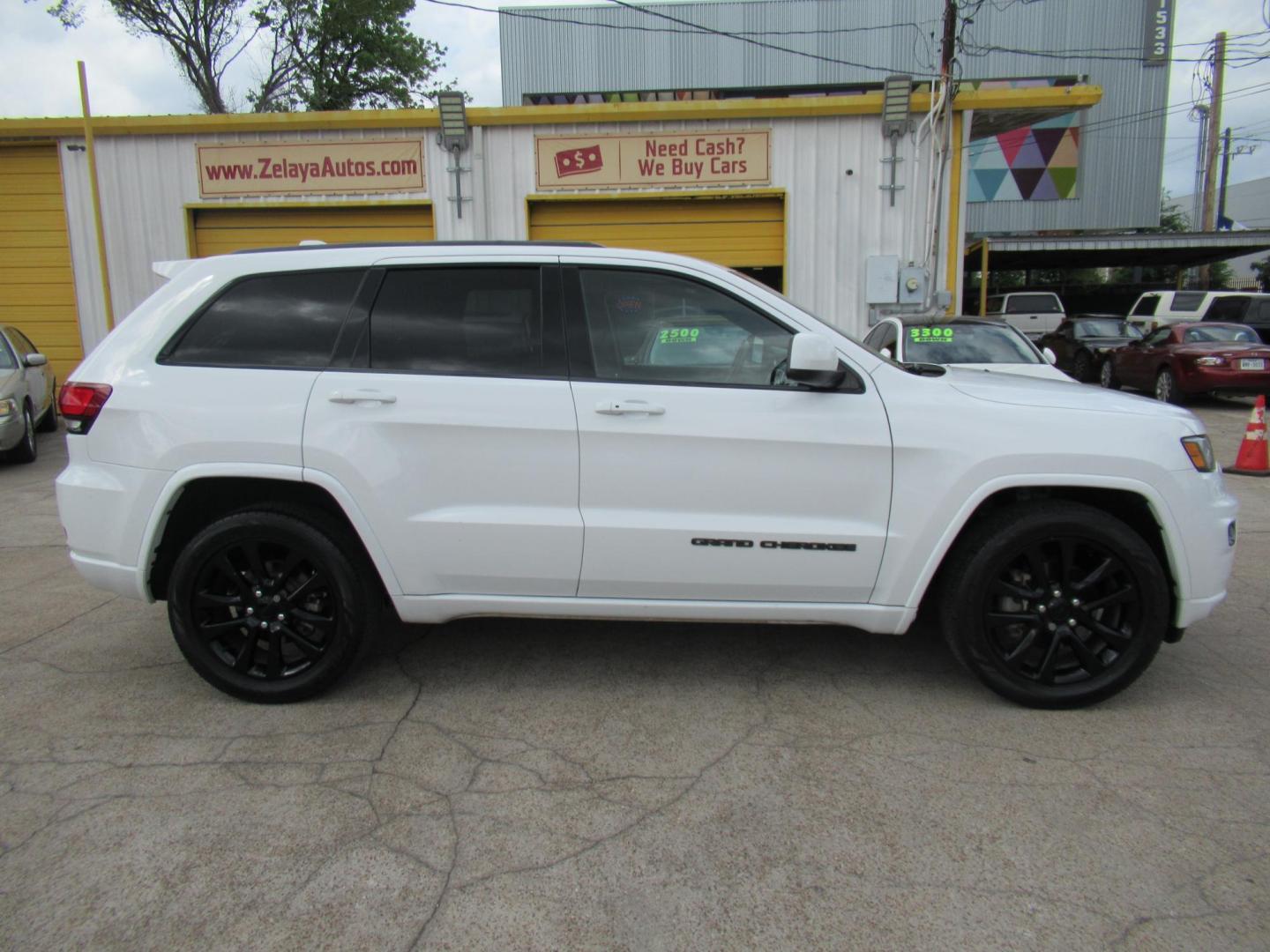 2018 White /Black Jeep Grand Cherokee Laredo 2WD (1C4RJEAG2JC) with an 3.6L V6 DOHC 24V engine, 8A transmission, located at 1511 North Shepherd Dr., Houston, TX, 77008, (281) 657-1221, 29.798361, -95.412560 - 2018 Jeep Grand Cherokee Altitude 157,176 mi VIN: 1C4RJEAG2JC208474 Vehicle Details 4 Door Wagon/Sport Utility 3.6L V6 F DOHC 24V Gasoline Rear wheel drive - Photo#16