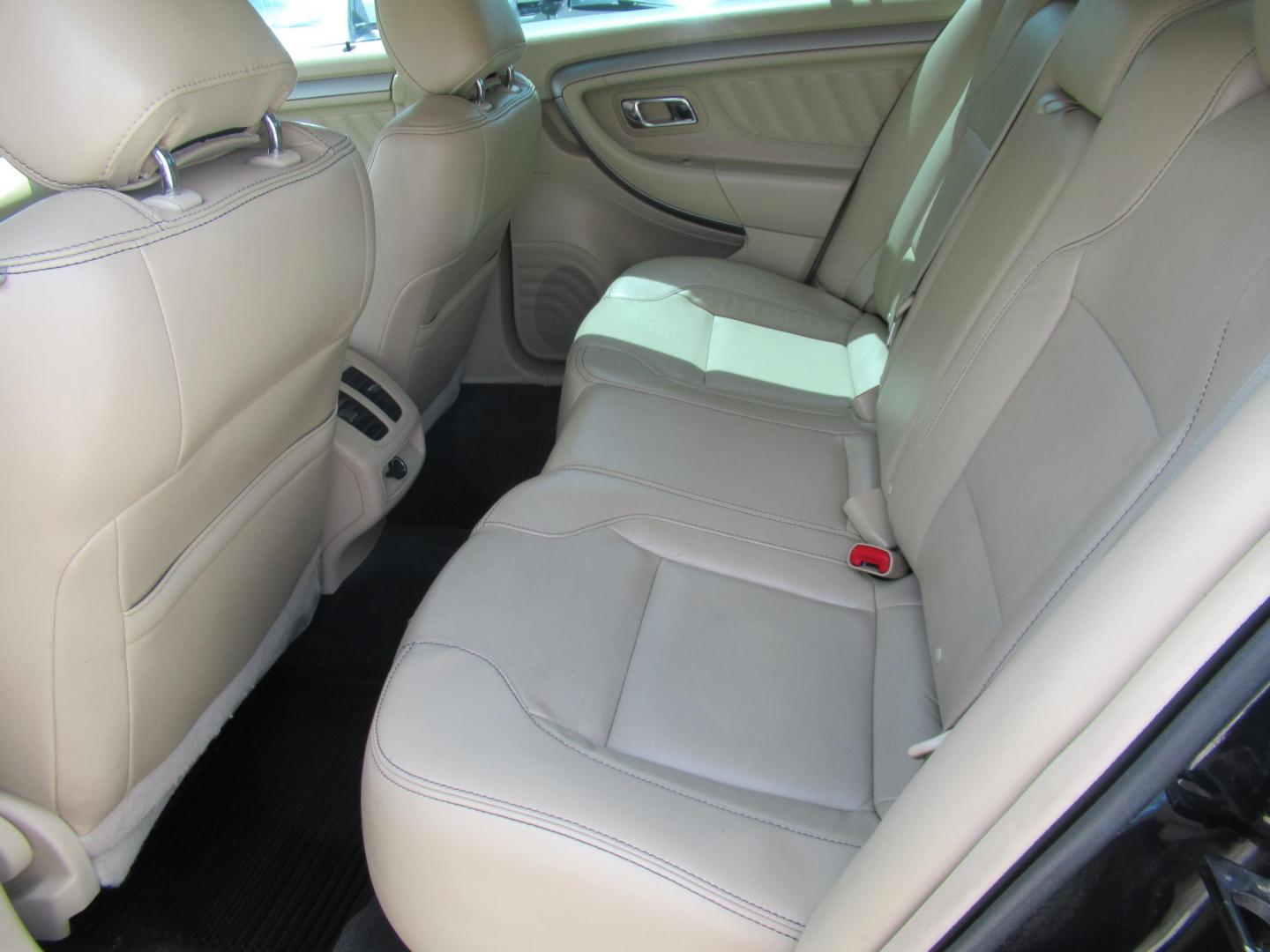 2014 Green /Tan Ford Taurus SEL FWD (1FAHP2E84EG) with an 3.5L V6 DOHC 24V engine, Automatic transmission, located at 1511 North Shepherd Dr., Houston, TX, 77008, (281) 657-1221, 29.798361, -95.412560 - 2014 Ford Taurus Sel 108,699 mi VIN: 1FAHP2E84EG109641 Original Window Sticker Vehicle Details Sedan 4 DR 3.5L V6 F DOHC 24V Gasoline Front wheel drive - Photo#5