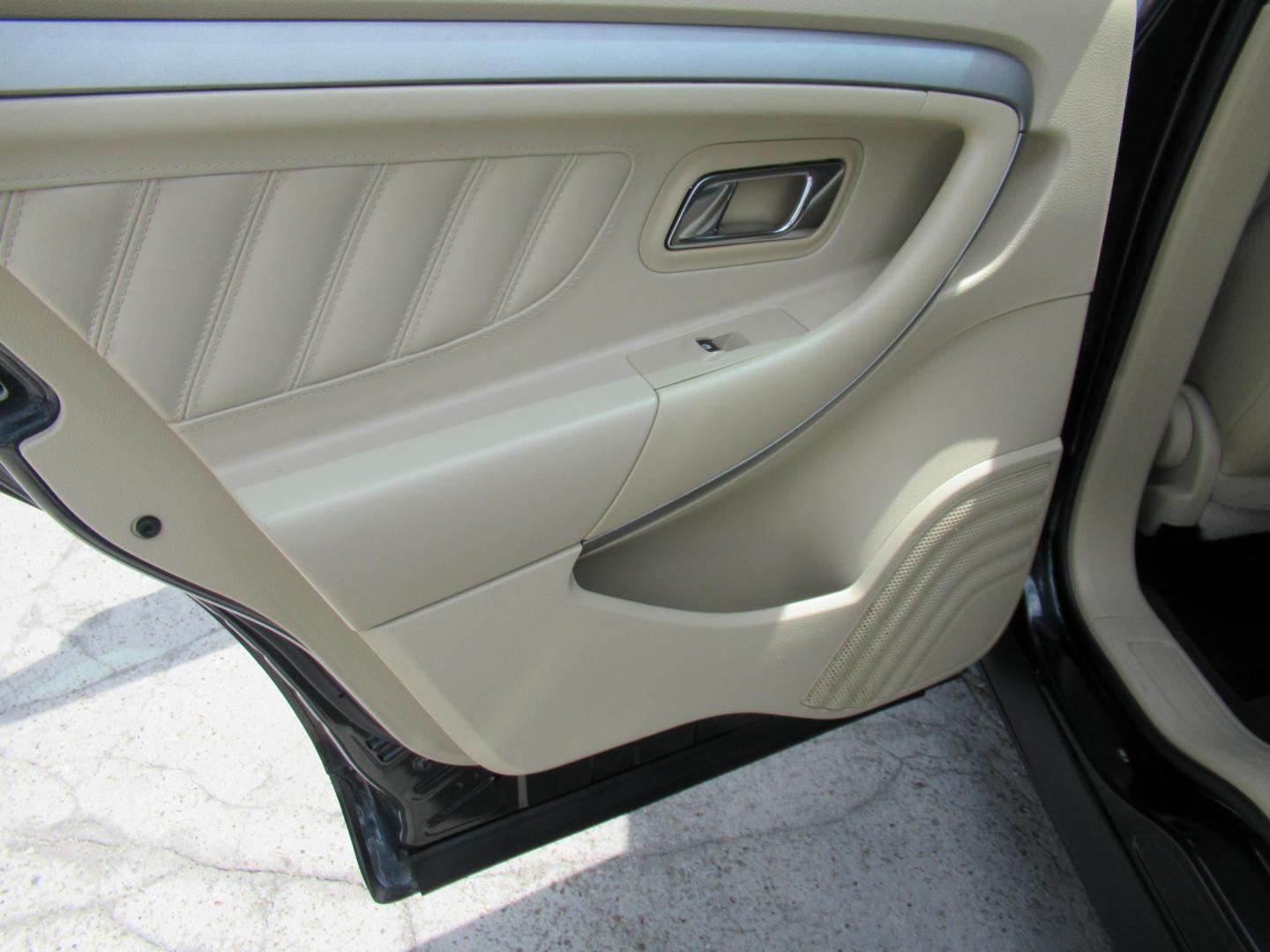 2014 Green /Tan Ford Taurus SEL FWD (1FAHP2E84EG) with an 3.5L V6 DOHC 24V engine, Automatic transmission, located at 1511 North Shepherd Dr., Houston, TX, 77008, (281) 657-1221, 29.798361, -95.412560 - 2014 Ford Taurus Sel 108,699 mi VIN: 1FAHP2E84EG109641 Original Window Sticker Vehicle Details Sedan 4 DR 3.5L V6 F DOHC 24V Gasoline Front wheel drive - Photo#6