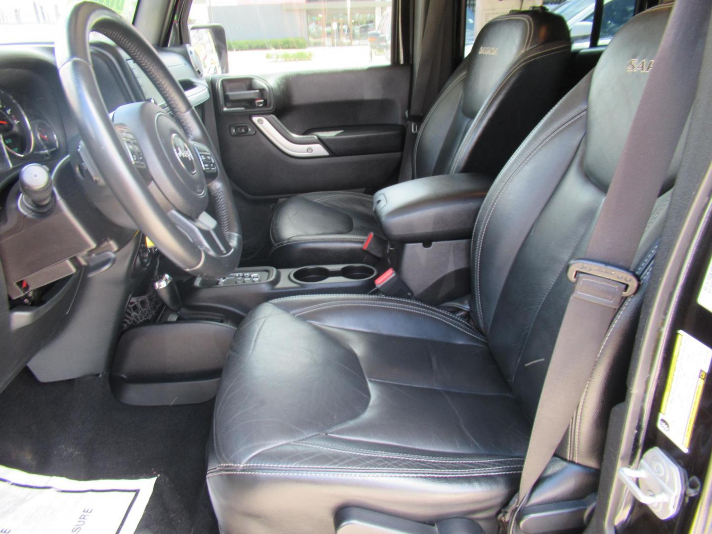 2016 Black /Black Jeep Wrangler Unlimited Sahara 4WD (1C4BJWEG3GL) with an 3.6L V6 DOHC 24V FFV engine, Automatic transmission, located at 1511 North Shepherd Dr., Houston, TX, 77008, (281) 657-1221, 29.798361, -95.412560 - 2016 Jeep Wrangler Unlimited Sahara 117,255 mi VIN: 1C4BJWEG3GL173289 Vehicle Details 4 Door Wagon/Sport Utility 3.6L V6 F DOHC 24V Gasoline Rear wheel drive w/ 4X4 - Photo#1