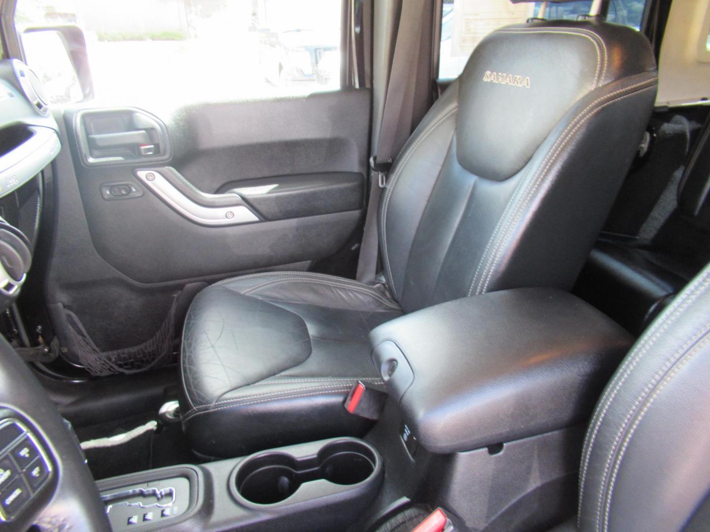 2016 Black /Black Jeep Wrangler Unlimited Sahara 4WD (1C4BJWEG3GL) with an 3.6L V6 DOHC 24V FFV engine, Automatic transmission, located at 1511 North Shepherd Dr., Houston, TX, 77008, (281) 657-1221, 29.798361, -95.412560 - 2016 Jeep Wrangler Unlimited Sahara 117,255 mi VIN: 1C4BJWEG3GL173289 Vehicle Details 4 Door Wagon/Sport Utility 3.6L V6 F DOHC 24V Gasoline Rear wheel drive w/ 4X4 - Photo#2