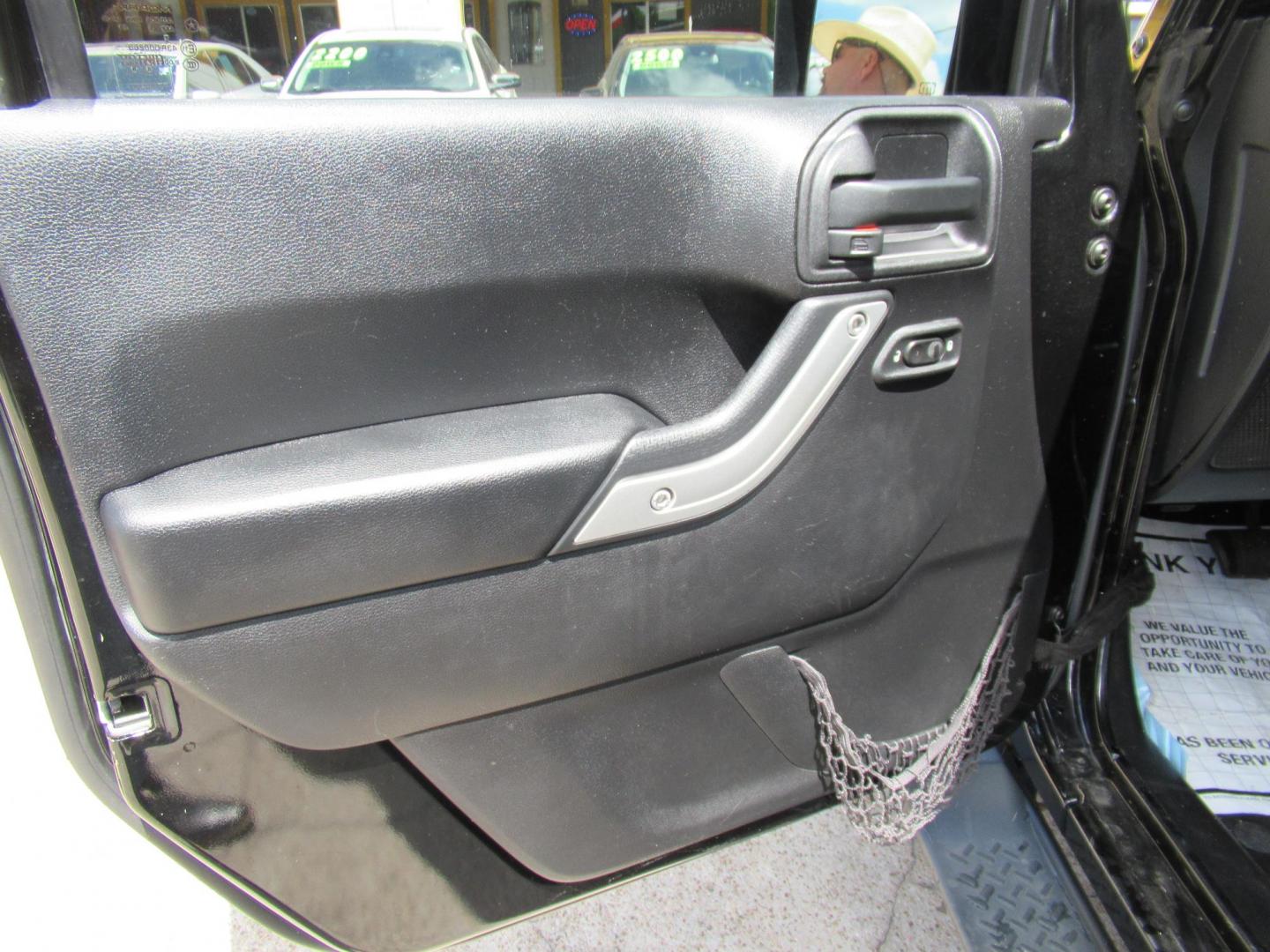 2016 Black /Black Jeep Wrangler Unlimited Sahara 4WD (1C4BJWEG3GL) with an 3.6L V6 DOHC 24V FFV engine, Automatic transmission, located at 1511 North Shepherd Dr., Houston, TX, 77008, (281) 657-1221, 29.798361, -95.412560 - 2016 Jeep Wrangler Unlimited Sahara 117,255 mi VIN: 1C4BJWEG3GL173289 Vehicle Details 4 Door Wagon/Sport Utility 3.6L V6 F DOHC 24V Gasoline Rear wheel drive w/ 4X4 - Photo#7