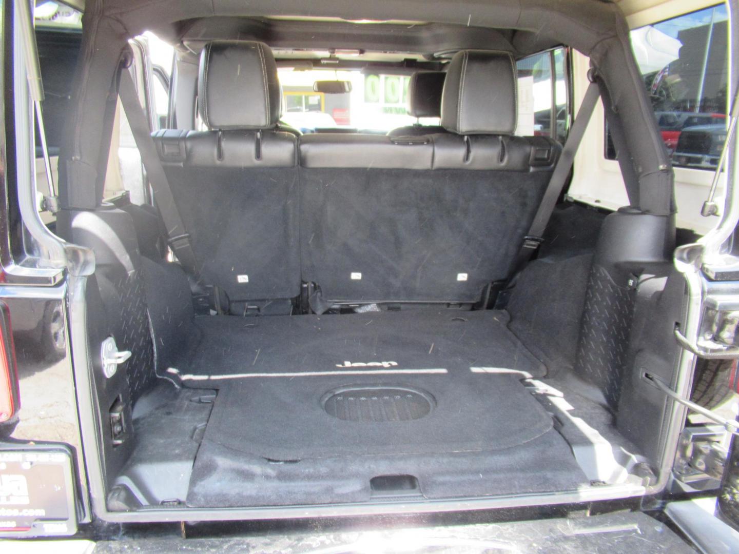 2016 Black /Black Jeep Wrangler Unlimited Sahara 4WD (1C4BJWEG3GL) with an 3.6L V6 DOHC 24V FFV engine, Automatic transmission, located at 1511 North Shepherd Dr., Houston, TX, 77008, (281) 657-1221, 29.798361, -95.412560 - 2016 Jeep Wrangler Unlimited Sahara 117,255 mi VIN: 1C4BJWEG3GL173289 Vehicle Details 4 Door Wagon/Sport Utility 3.6L V6 F DOHC 24V Gasoline Rear wheel drive w/ 4X4 - Photo#11