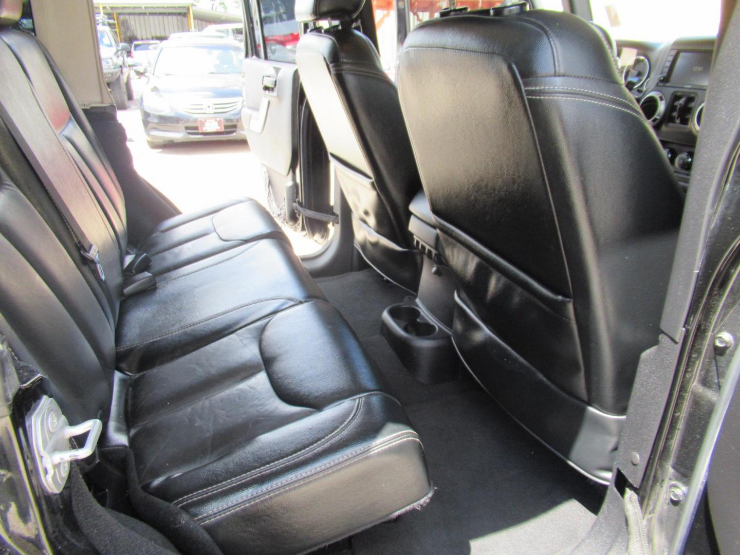 2016 Black /Black Jeep Wrangler Unlimited Sahara 4WD (1C4BJWEG3GL) with an 3.6L V6 DOHC 24V FFV engine, Automatic transmission, located at 1511 North Shepherd Dr., Houston, TX, 77008, (281) 657-1221, 29.798361, -95.412560 - 2016 Jeep Wrangler Unlimited Sahara 117,255 mi VIN: 1C4BJWEG3GL173289 Vehicle Details 4 Door Wagon/Sport Utility 3.6L V6 F DOHC 24V Gasoline Rear wheel drive w/ 4X4 - Photo#12