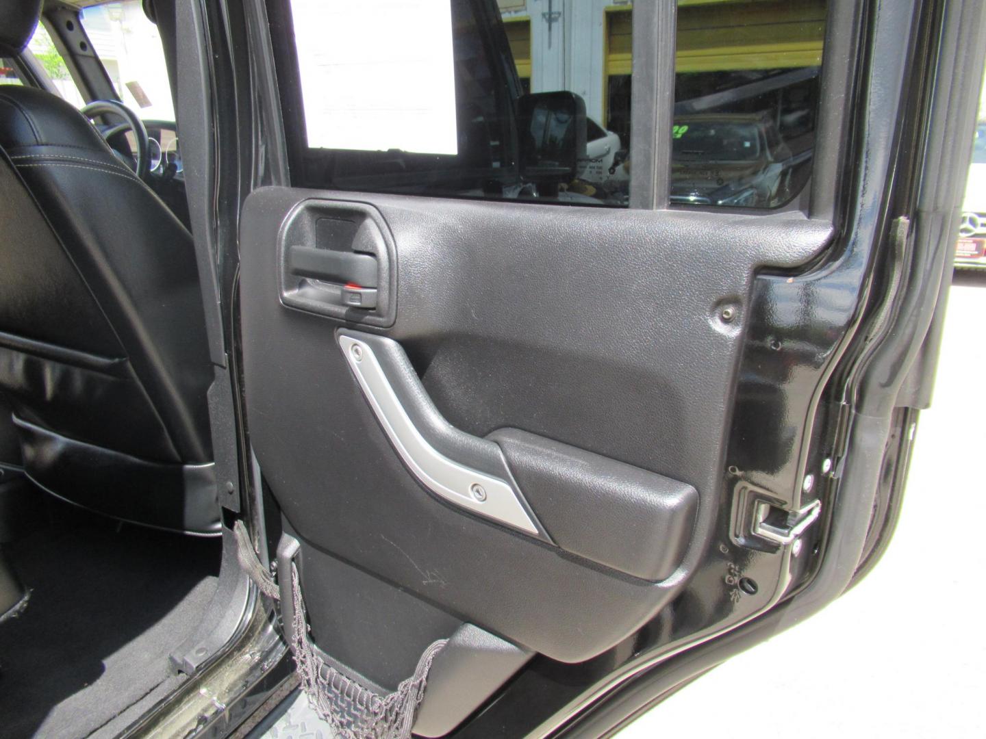 2016 Black /Black Jeep Wrangler Unlimited Sahara 4WD (1C4BJWEG3GL) with an 3.6L V6 DOHC 24V FFV engine, Automatic transmission, located at 1511 North Shepherd Dr., Houston, TX, 77008, (281) 657-1221, 29.798361, -95.412560 - 2016 Jeep Wrangler Unlimited Sahara 117,255 mi VIN: 1C4BJWEG3GL173289 Vehicle Details 4 Door Wagon/Sport Utility 3.6L V6 F DOHC 24V Gasoline Rear wheel drive w/ 4X4 - Photo#13