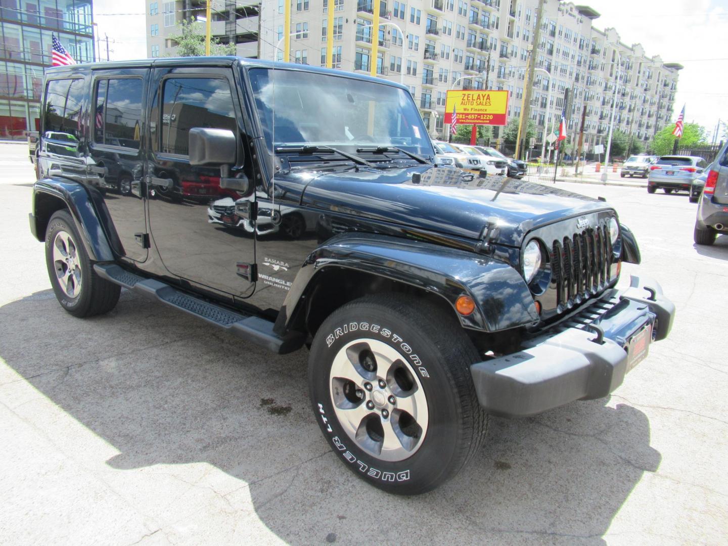2016 Black /Black Jeep Wrangler Unlimited Sahara 4WD (1C4BJWEG3GL) with an 3.6L V6 DOHC 24V FFV engine, Automatic transmission, located at 1511 North Shepherd Dr., Houston, TX, 77008, (281) 657-1221, 29.798361, -95.412560 - 2016 Jeep Wrangler Unlimited Sahara 117,255 mi VIN: 1C4BJWEG3GL173289 Vehicle Details 4 Door Wagon/Sport Utility 3.6L V6 F DOHC 24V Gasoline Rear wheel drive w/ 4X4 - Photo#20