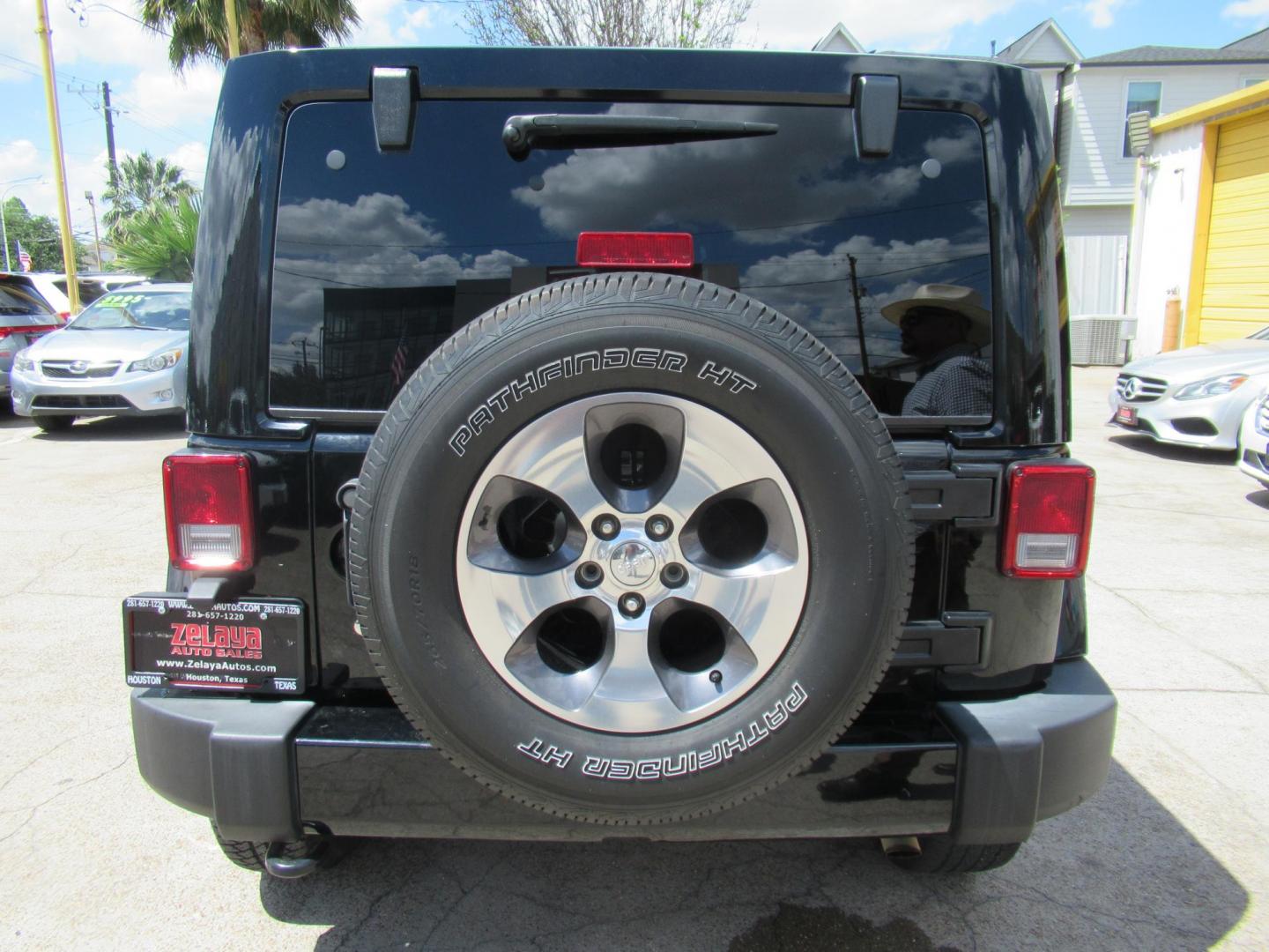 2016 Black /Black Jeep Wrangler Unlimited Sahara 4WD (1C4BJWEG3GL) with an 3.6L V6 DOHC 24V FFV engine, Automatic transmission, located at 1511 North Shepherd Dr., Houston, TX, 77008, (281) 657-1221, 29.798361, -95.412560 - 2016 Jeep Wrangler Unlimited Sahara 117,255 mi VIN: 1C4BJWEG3GL173289 Vehicle Details 4 Door Wagon/Sport Utility 3.6L V6 F DOHC 24V Gasoline Rear wheel drive w/ 4X4 - Photo#23