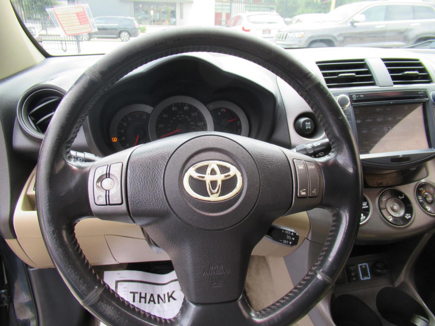 2009 Green /Tan Toyota RAV4 Limited I4 4WD (JTMBF31V395) with an 2.4L L4 DOHC 16V engine, 4-Speed Automatic transmission, located at 1511 North Shepherd Dr., Houston, TX, 77008, (281) 657-1221, 29.798361, -95.412560 - 2009 Toyota Rav4 Limited 172,904 mi VIN: JTMBF31V395011223 Vehicle Details 4 Door Wagon/Sport Utility 2.5L I4 F DOHC 16V Gasoline All wheel drive- Photo#4