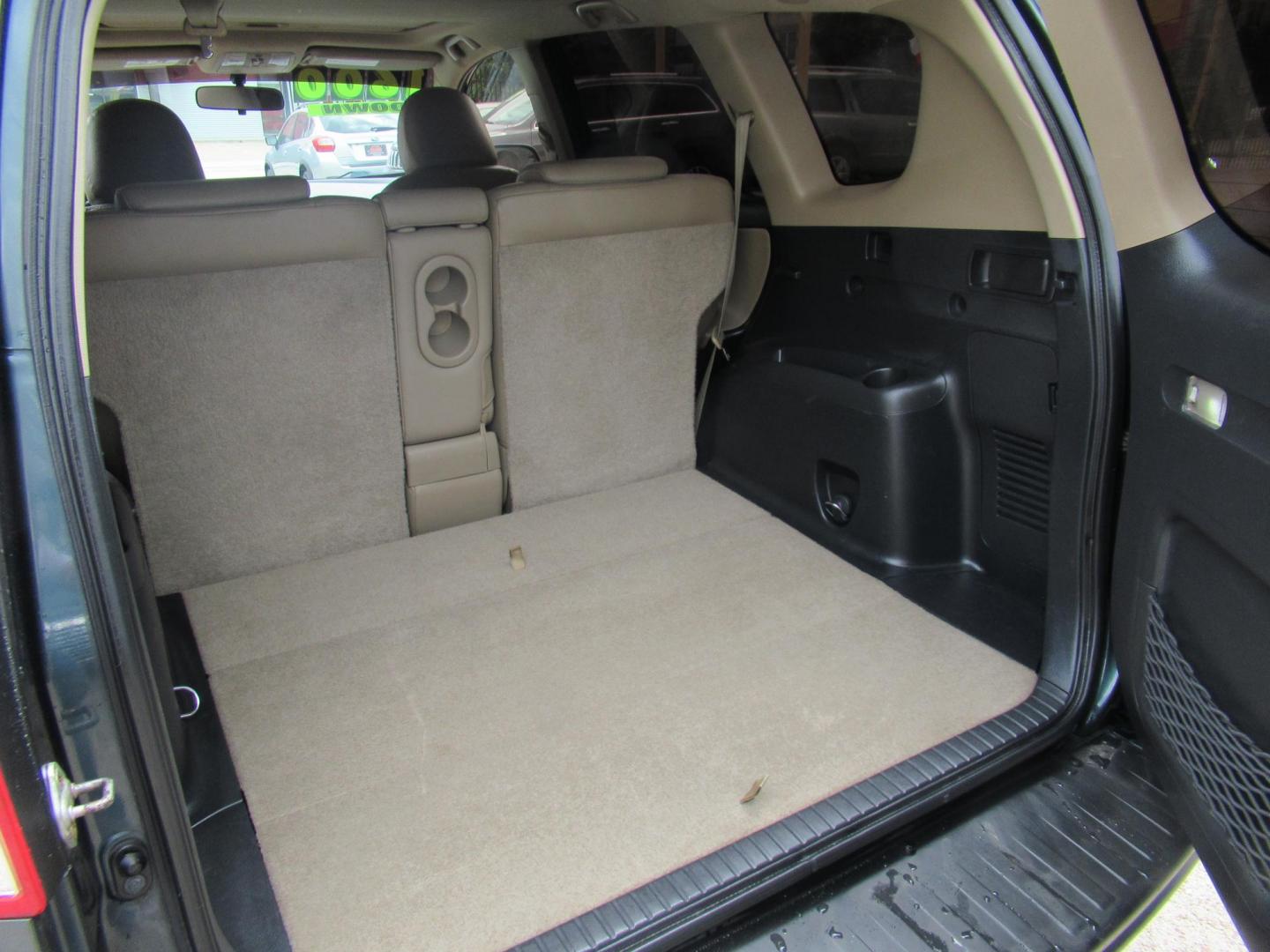 2009 Green /Tan Toyota RAV4 Limited I4 4WD (JTMBF31V395) with an 2.4L L4 DOHC 16V engine, 4-Speed Automatic transmission, located at 1511 North Shepherd Dr., Houston, TX, 77008, (281) 657-1221, 29.798361, -95.412560 - 2009 Toyota Rav4 Limited 172,904 mi VIN: JTMBF31V395011223 Vehicle Details 4 Door Wagon/Sport Utility 2.5L I4 F DOHC 16V Gasoline All wheel drive- Photo#10