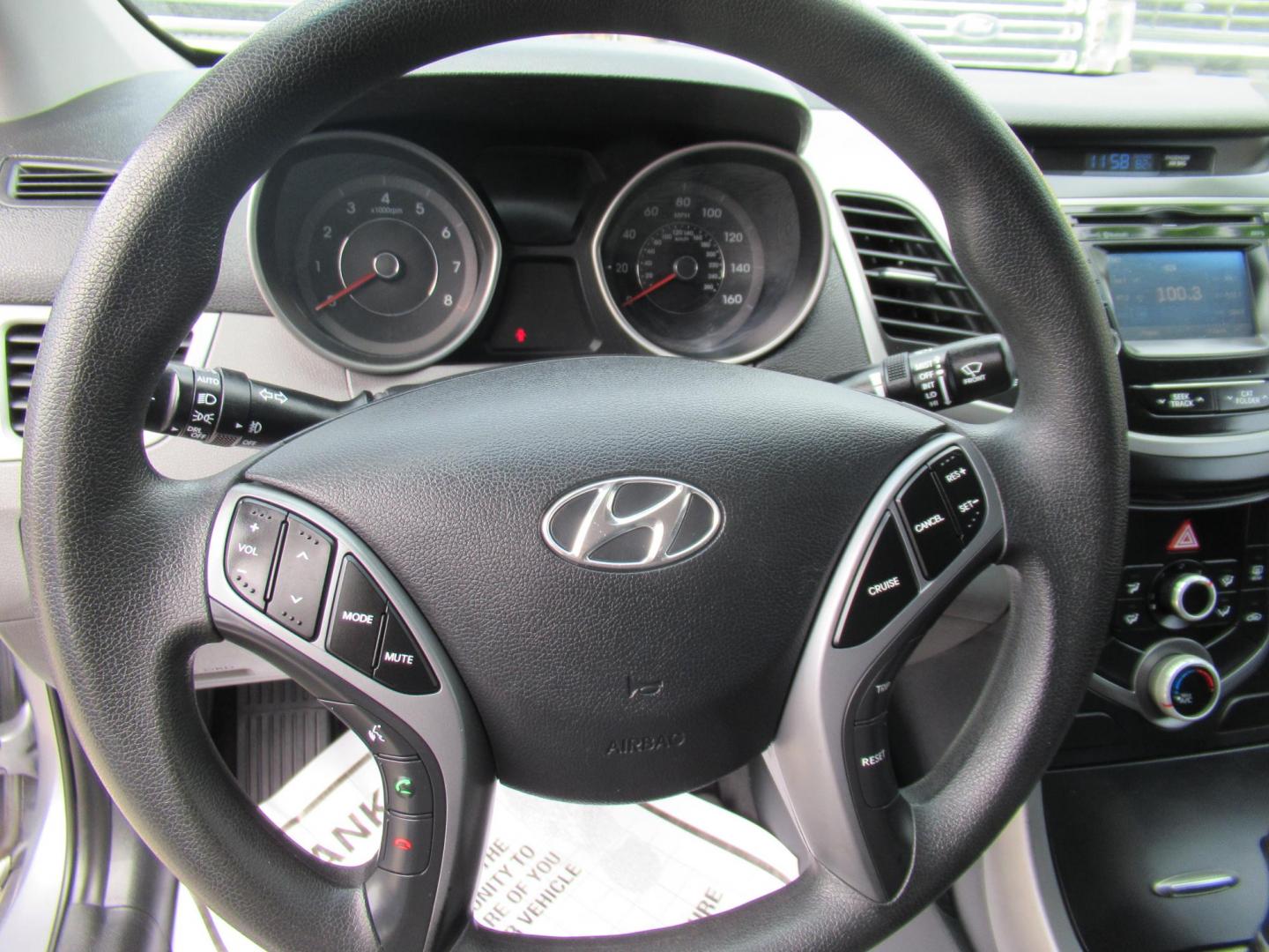 2016 BLUE /Gray Hyundai Elantra Limited (5NPDH4AE6GH) with an 1.8L L4 DOHC 16V engine, 6-Speed Automatic transmission, located at 1511 North Shepherd Dr., Houston, TX, 77008, (281) 657-1221, 29.798361, -95.412560 - 2016 Hyundai Elantra SE 135,085 mi VIN: 5NPDH4AE6GH703689 Original Window Sticker Vehicle Details Sedan 4 DR 1.8L I4 F DOHC 16V Gasoline Front wheel drive - Photo#4