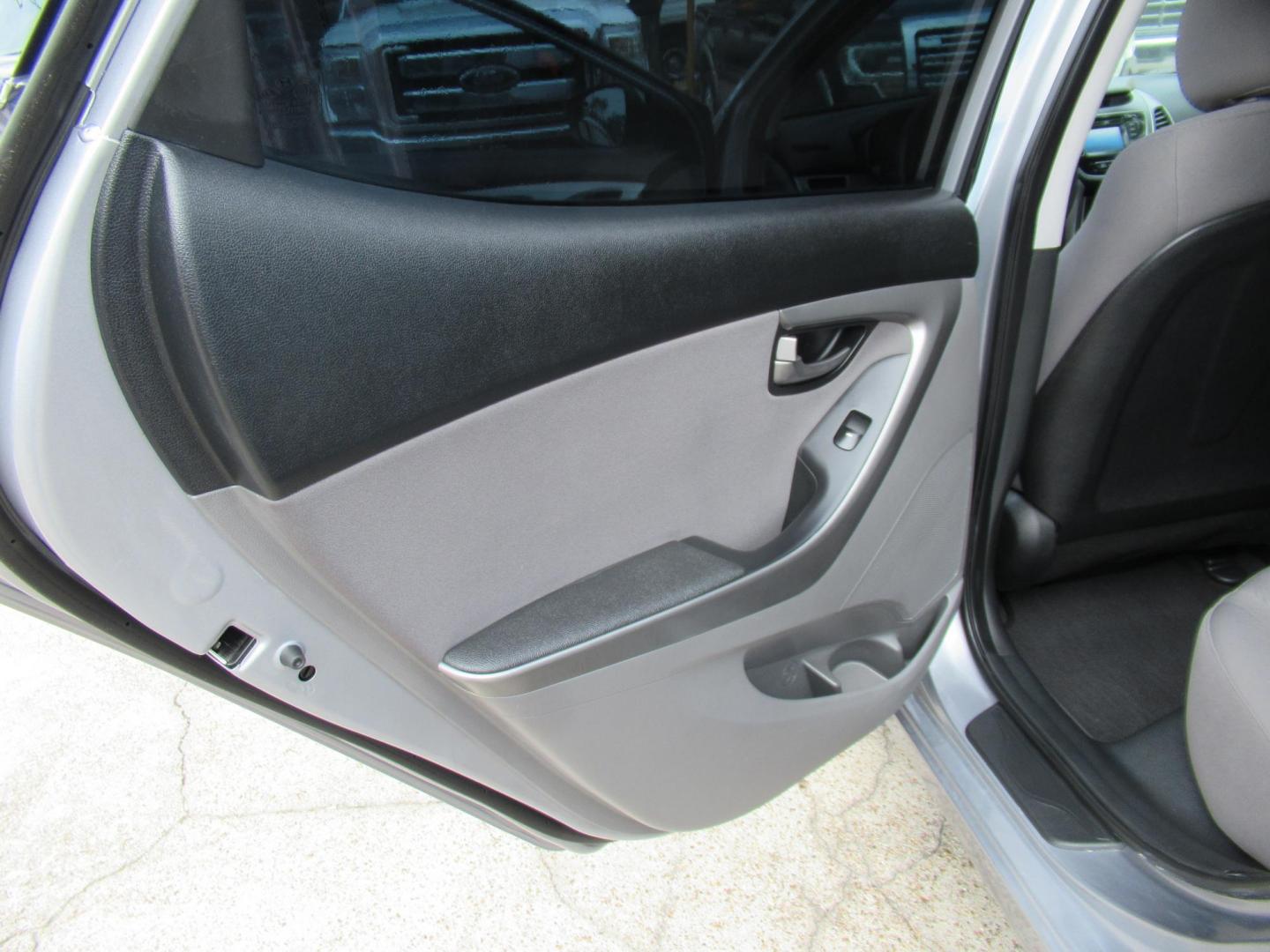 2016 BLUE /Gray Hyundai Elantra Limited (5NPDH4AE6GH) with an 1.8L L4 DOHC 16V engine, 6-Speed Automatic transmission, located at 1511 North Shepherd Dr., Houston, TX, 77008, (281) 657-1221, 29.798361, -95.412560 - 2016 Hyundai Elantra SE 135,085 mi VIN: 5NPDH4AE6GH703689 Original Window Sticker Vehicle Details Sedan 4 DR 1.8L I4 F DOHC 16V Gasoline Front wheel drive - Photo#7