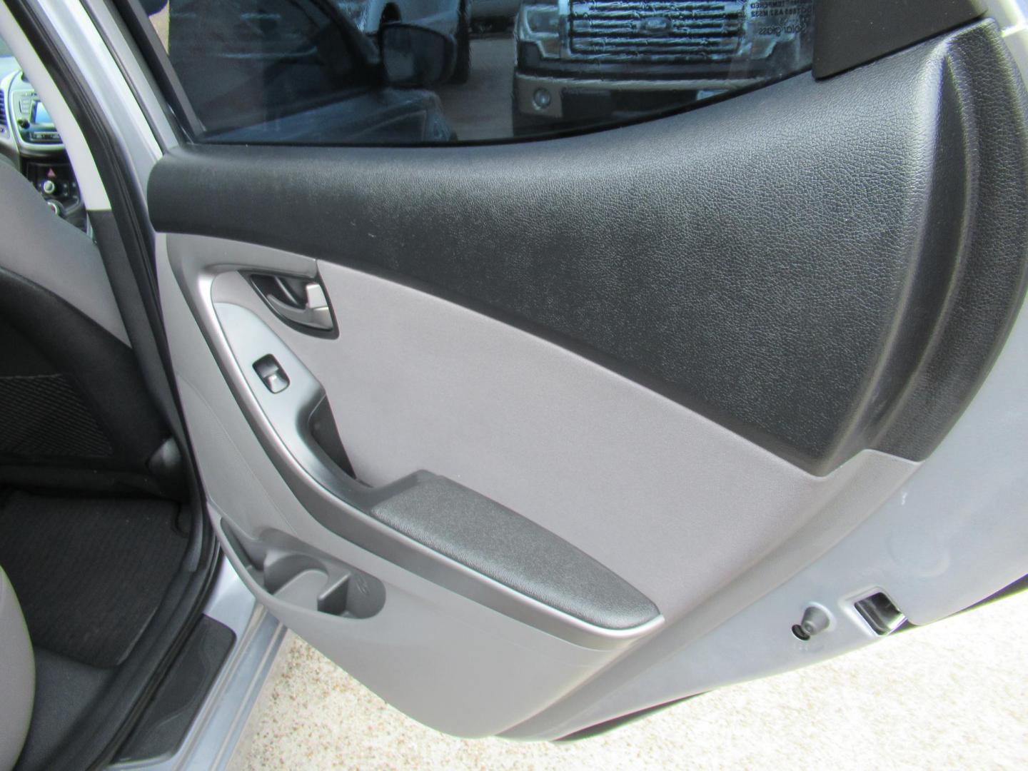 2016 BLUE /Gray Hyundai Elantra Limited (5NPDH4AE6GH) with an 1.8L L4 DOHC 16V engine, 6-Speed Automatic transmission, located at 1511 North Shepherd Dr., Houston, TX, 77008, (281) 657-1221, 29.798361, -95.412560 - 2016 Hyundai Elantra SE 135,085 mi VIN: 5NPDH4AE6GH703689 Original Window Sticker Vehicle Details Sedan 4 DR 1.8L I4 F DOHC 16V Gasoline Front wheel drive - Photo#9