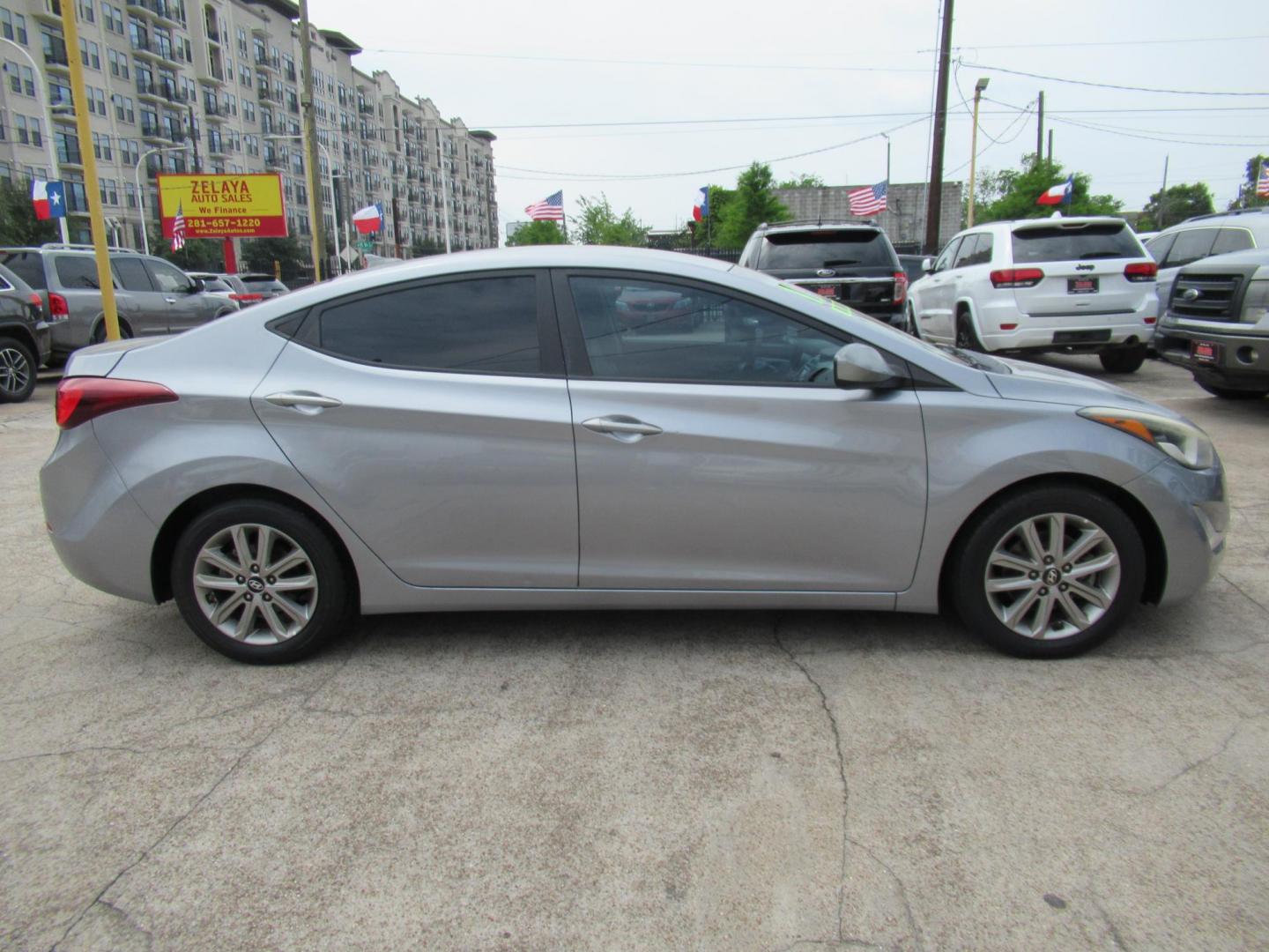 2016 BLUE /Gray Hyundai Elantra Limited (5NPDH4AE6GH) with an 1.8L L4 DOHC 16V engine, 6-Speed Automatic transmission, located at 1511 North Shepherd Dr., Houston, TX, 77008, (281) 657-1221, 29.798361, -95.412560 - 2016 Hyundai Elantra SE 135,085 mi VIN: 5NPDH4AE6GH703689 Original Window Sticker Vehicle Details Sedan 4 DR 1.8L I4 F DOHC 16V Gasoline Front wheel drive - Photo#13