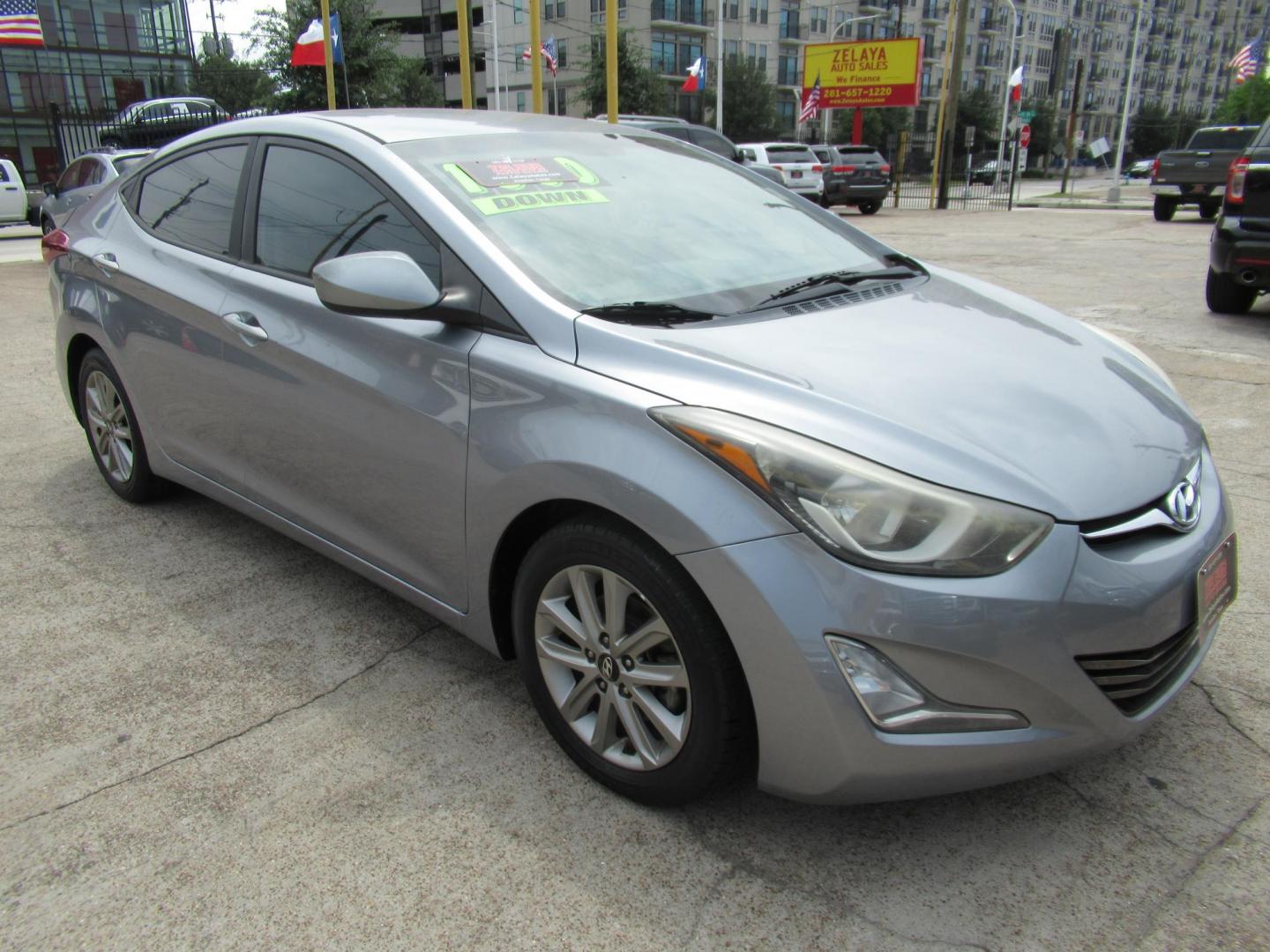 2016 BLUE /Gray Hyundai Elantra Limited (5NPDH4AE6GH) with an 1.8L L4 DOHC 16V engine, 6-Speed Automatic transmission, located at 1511 North Shepherd Dr., Houston, TX, 77008, (281) 657-1221, 29.798361, -95.412560 - 2016 Hyundai Elantra SE 135,085 mi VIN: 5NPDH4AE6GH703689 Original Window Sticker Vehicle Details Sedan 4 DR 1.8L I4 F DOHC 16V Gasoline Front wheel drive - Photo#14