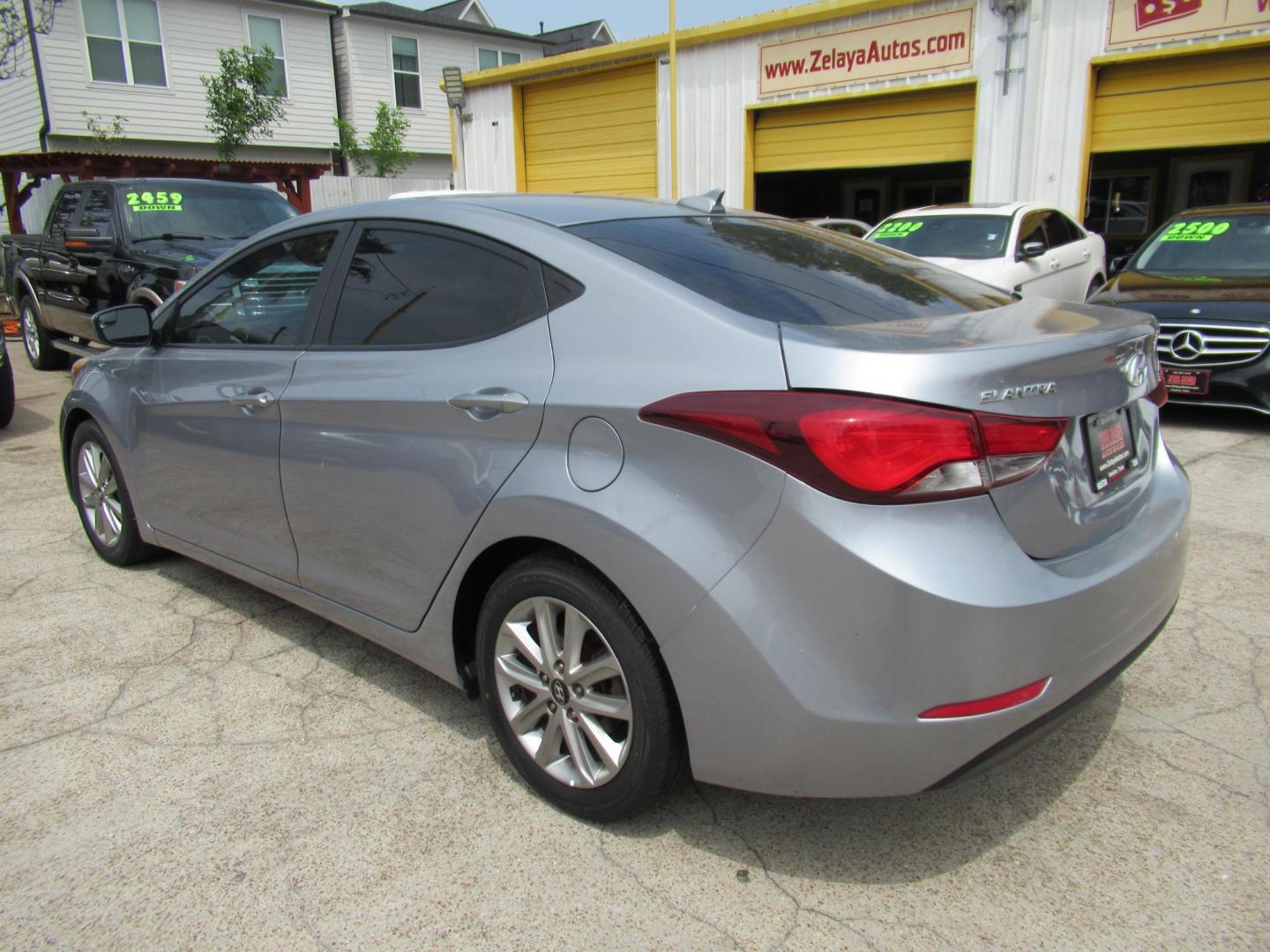 2016 BLUE /Gray Hyundai Elantra Limited (5NPDH4AE6GH) with an 1.8L L4 DOHC 16V engine, 6-Speed Automatic transmission, located at 1511 North Shepherd Dr., Houston, TX, 77008, (281) 657-1221, 29.798361, -95.412560 - 2016 Hyundai Elantra SE 135,085 mi VIN: 5NPDH4AE6GH703689 Original Window Sticker Vehicle Details Sedan 4 DR 1.8L I4 F DOHC 16V Gasoline Front wheel drive - Photo#17