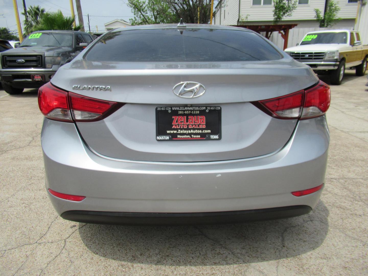 2016 BLUE /Gray Hyundai Elantra Limited (5NPDH4AE6GH) with an 1.8L L4 DOHC 16V engine, 6-Speed Automatic transmission, located at 1511 North Shepherd Dr., Houston, TX, 77008, (281) 657-1221, 29.798361, -95.412560 - 2016 Hyundai Elantra SE 135,085 mi VIN: 5NPDH4AE6GH703689 Original Window Sticker Vehicle Details Sedan 4 DR 1.8L I4 F DOHC 16V Gasoline Front wheel drive - Photo#18