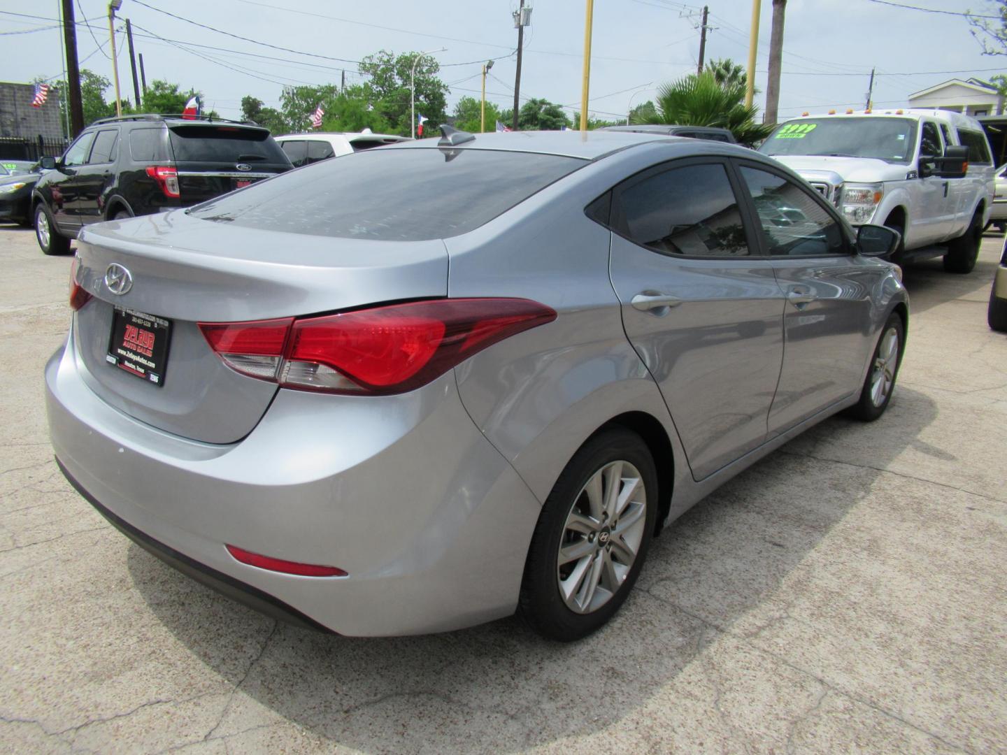 2016 BLUE /Gray Hyundai Elantra Limited (5NPDH4AE6GH) with an 1.8L L4 DOHC 16V engine, 6-Speed Automatic transmission, located at 1511 North Shepherd Dr., Houston, TX, 77008, (281) 657-1221, 29.798361, -95.412560 - 2016 Hyundai Elantra SE 135,085 mi VIN: 5NPDH4AE6GH703689 Original Window Sticker Vehicle Details Sedan 4 DR 1.8L I4 F DOHC 16V Gasoline Front wheel drive - Photo#19