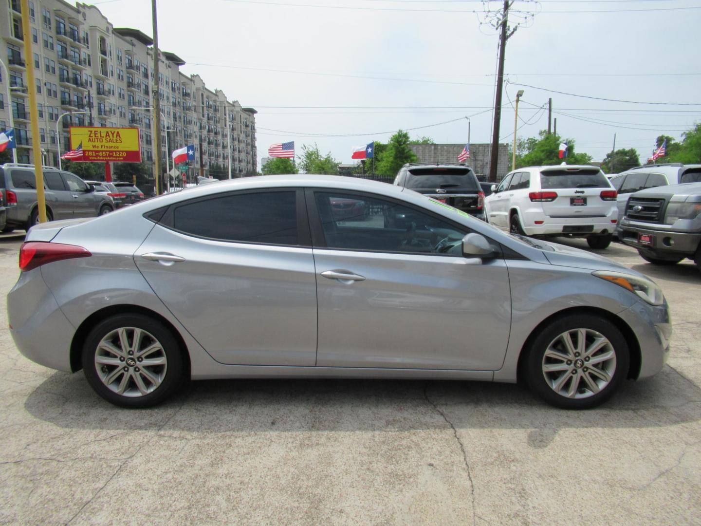 2016 BLUE /Gray Hyundai Elantra Limited (5NPDH4AE6GH) with an 1.8L L4 DOHC 16V engine, 6-Speed Automatic transmission, located at 1511 North Shepherd Dr., Houston, TX, 77008, (281) 657-1221, 29.798361, -95.412560 - 2016 Hyundai Elantra SE 135,085 mi VIN: 5NPDH4AE6GH703689 Original Window Sticker Vehicle Details Sedan 4 DR 1.8L I4 F DOHC 16V Gasoline Front wheel drive - Photo#20