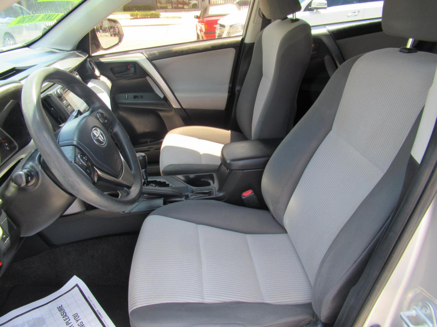 2015 Silver /Black Toyota RAV4 LE FWD (JTMZFREV0FD) with an 2.5L L4 DOHC 16V engine, 6-Speed Automatic transmission, located at 1511 North Shepherd Dr., Houston, TX, 77008, (281) 657-1221, 29.798361, -95.412560 - 2015 Toyota Rav4 LE 132,133 mi VIN: JTMZFREV0FD078567 Vehicle Details 4 Door Wagon/Sport Utility 2.5L I4 F DOHC 16V Gasoline Front wheel drive - Photo#8