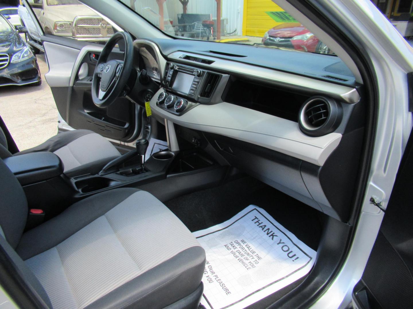 2015 Silver /Black Toyota RAV4 LE FWD (JTMZFREV0FD) with an 2.5L L4 DOHC 16V engine, 6-Speed Automatic transmission, located at 1511 North Shepherd Dr., Houston, TX, 77008, (281) 657-1221, 29.798361, -95.412560 - 2015 Toyota Rav4 LE 132,133 mi VIN: JTMZFREV0FD078567 Vehicle Details 4 Door Wagon/Sport Utility 2.5L I4 F DOHC 16V Gasoline Front wheel drive - Photo#16